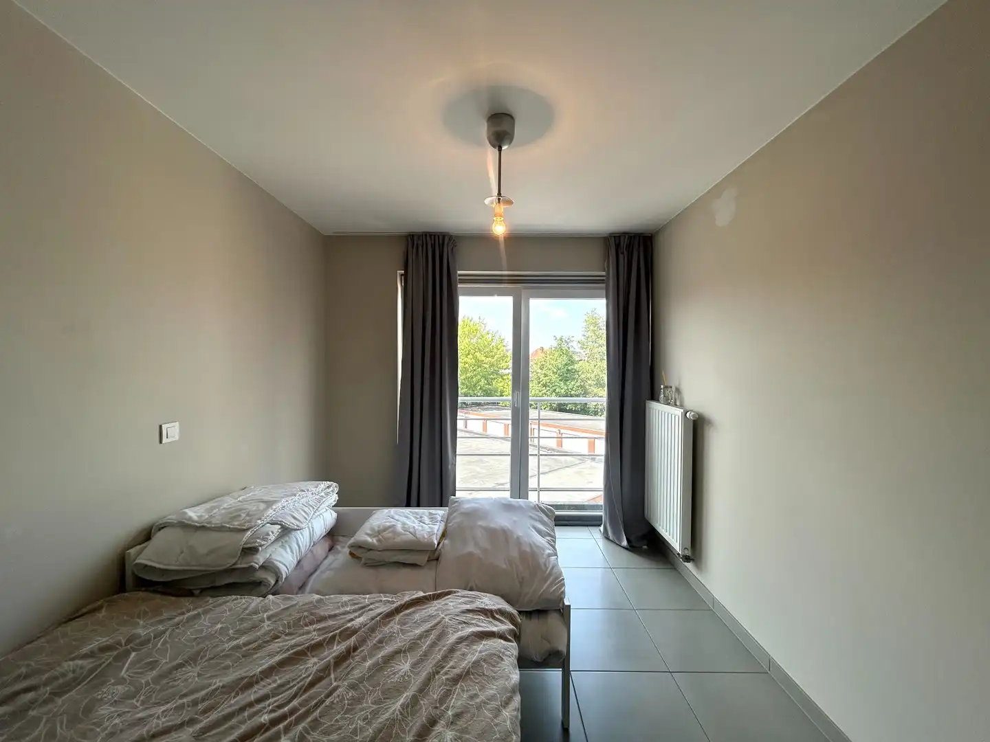 Instapklaar twee-slaapkamerappartement met 2 terrassen te centrum Roeselare! foto 8