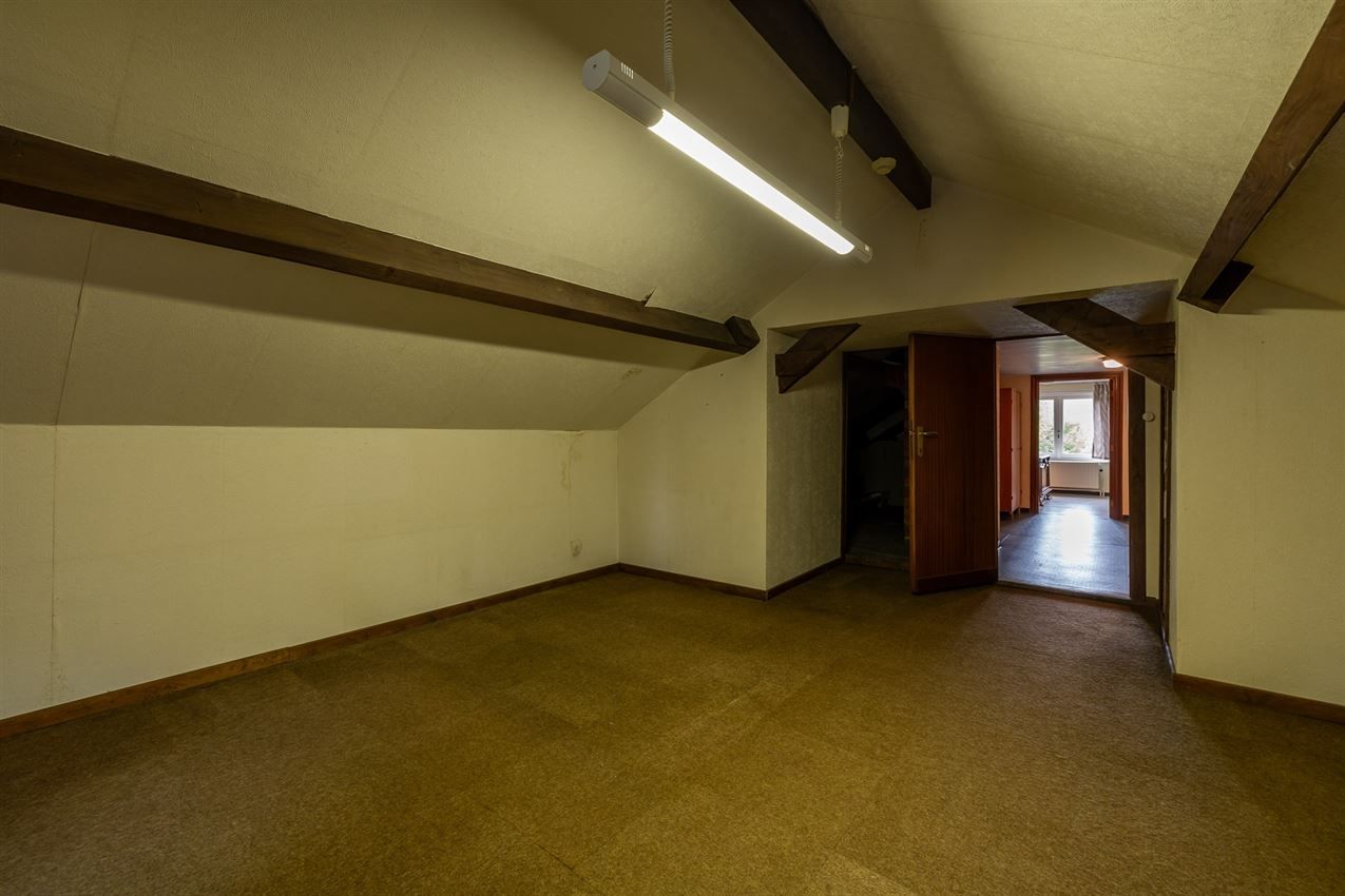 Te renoveren woning met 4 slk. in het hart van Averbode foto 27