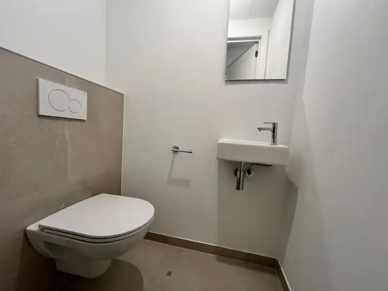 App met 2  slpkm, garage en kelderberging foto 18