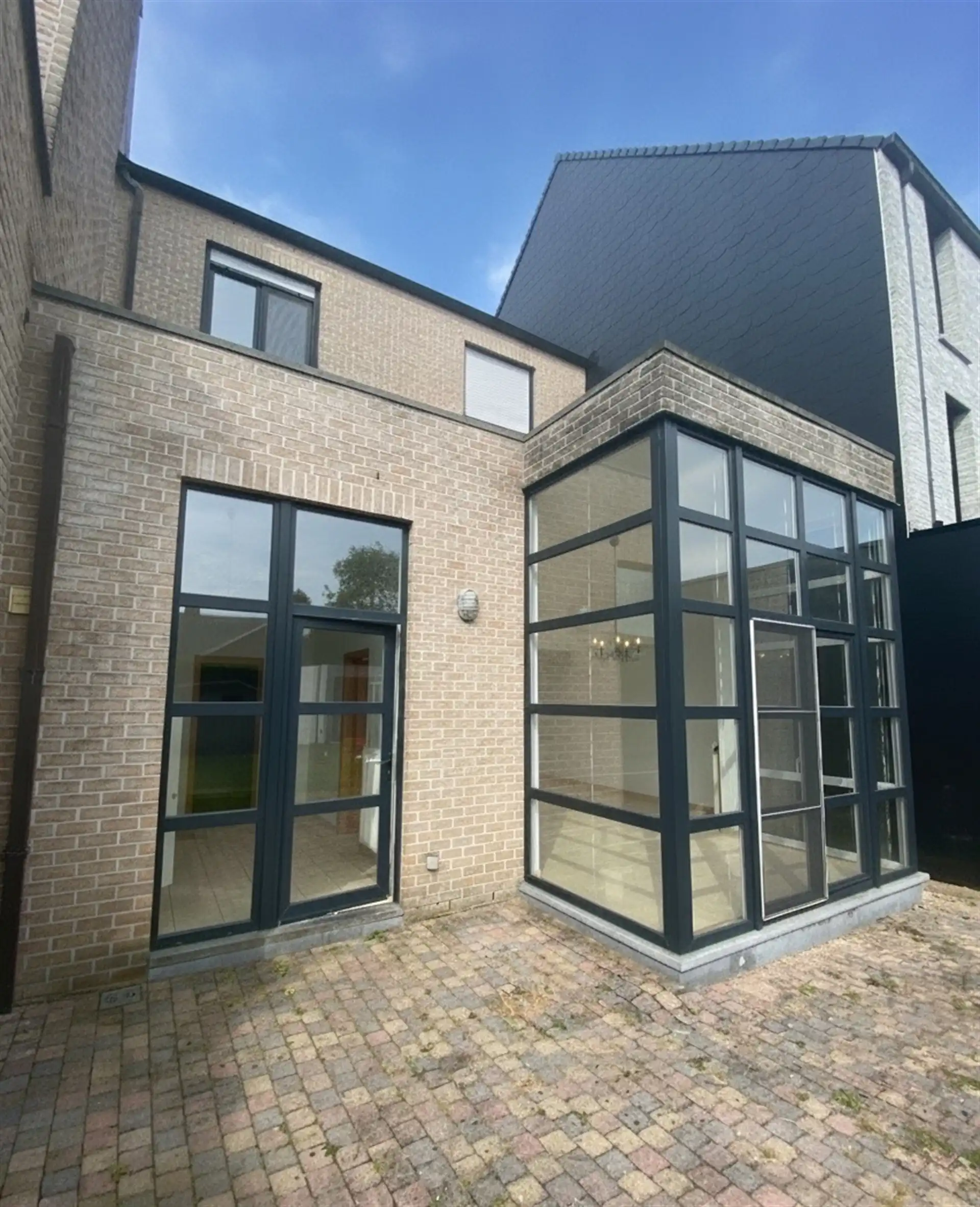 Ruime en lichtrijke woning met aangename west-geörienteerde tuin, gelegen in een rustige en doodlopende straat op wandelafstand van het centrum van Kortenberg. foto 21