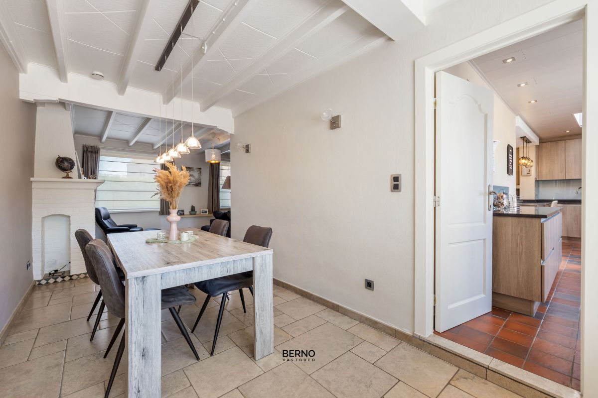 Instapklare rijwoning met 3 slaapkamers, ruime garage en zongerichte tuin. foto 10