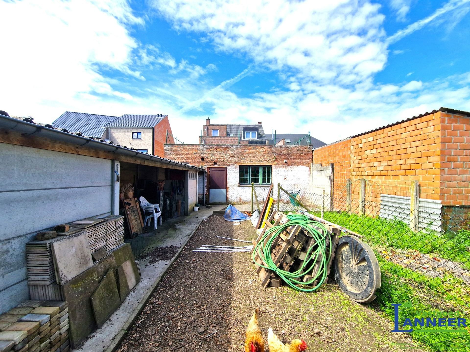 Groot Comm. gelijkvloers met tuin en verhuurd duplex app foto 6