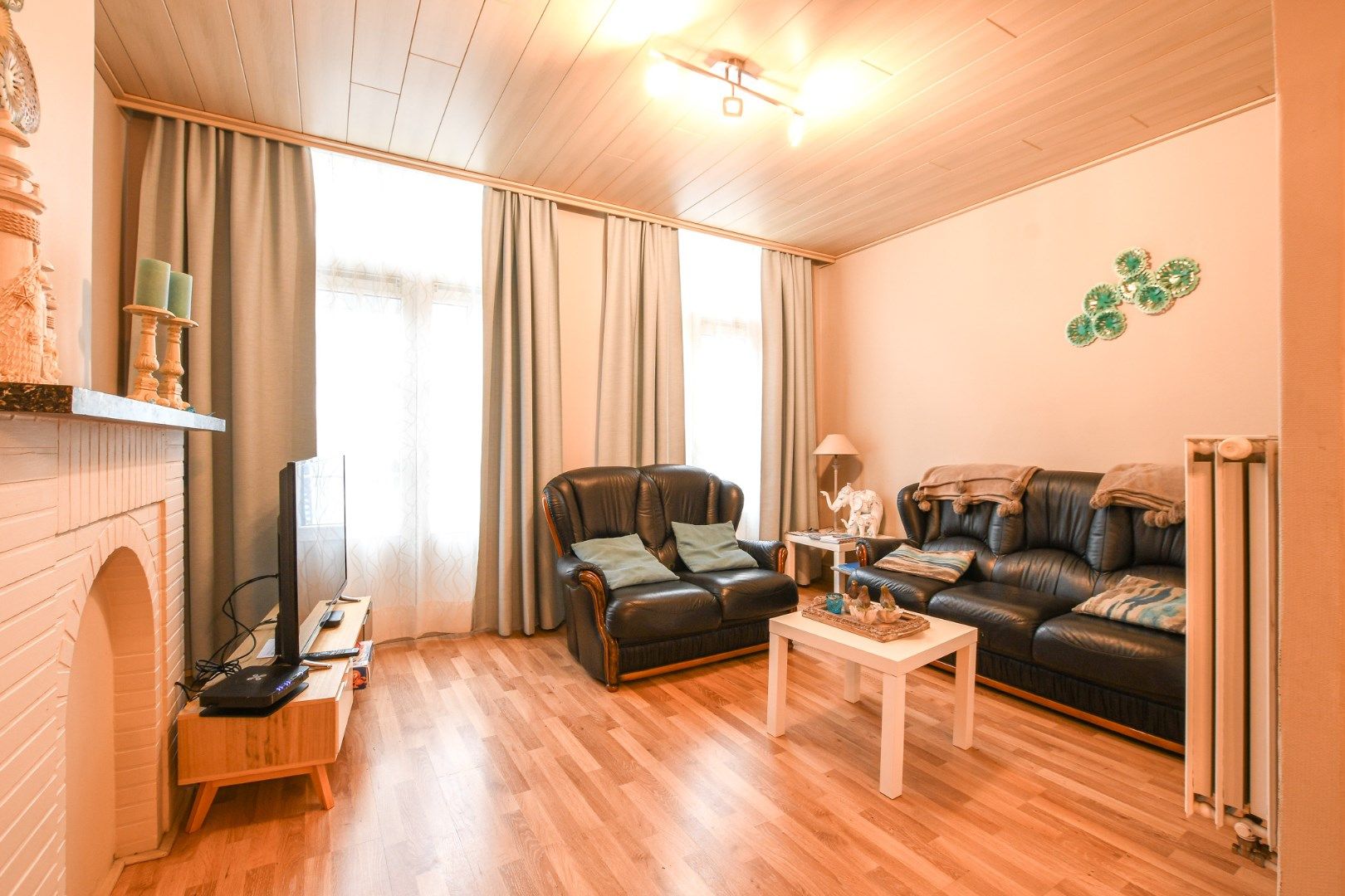 Opbrengsteigendom met 2 ruime appartementen en handelszaak op toplocatie! foto 25