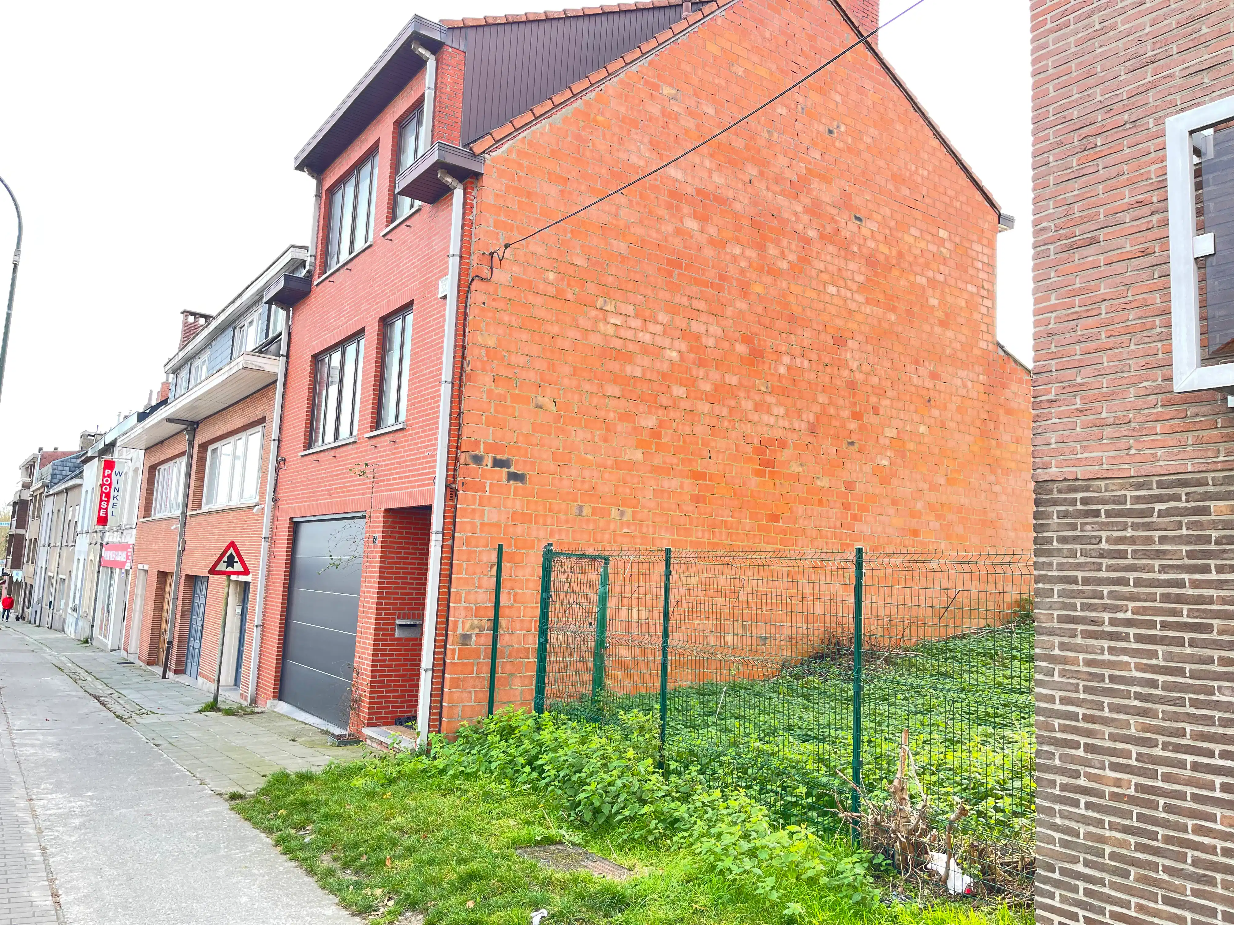 Bouwgrond 2 gevel woning met tuin foto 2