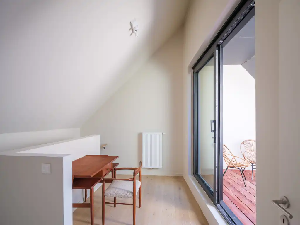 Hoogwaardig gerenoveerd duplex appartement met zonnig terras in het centrum van Gent foto 3