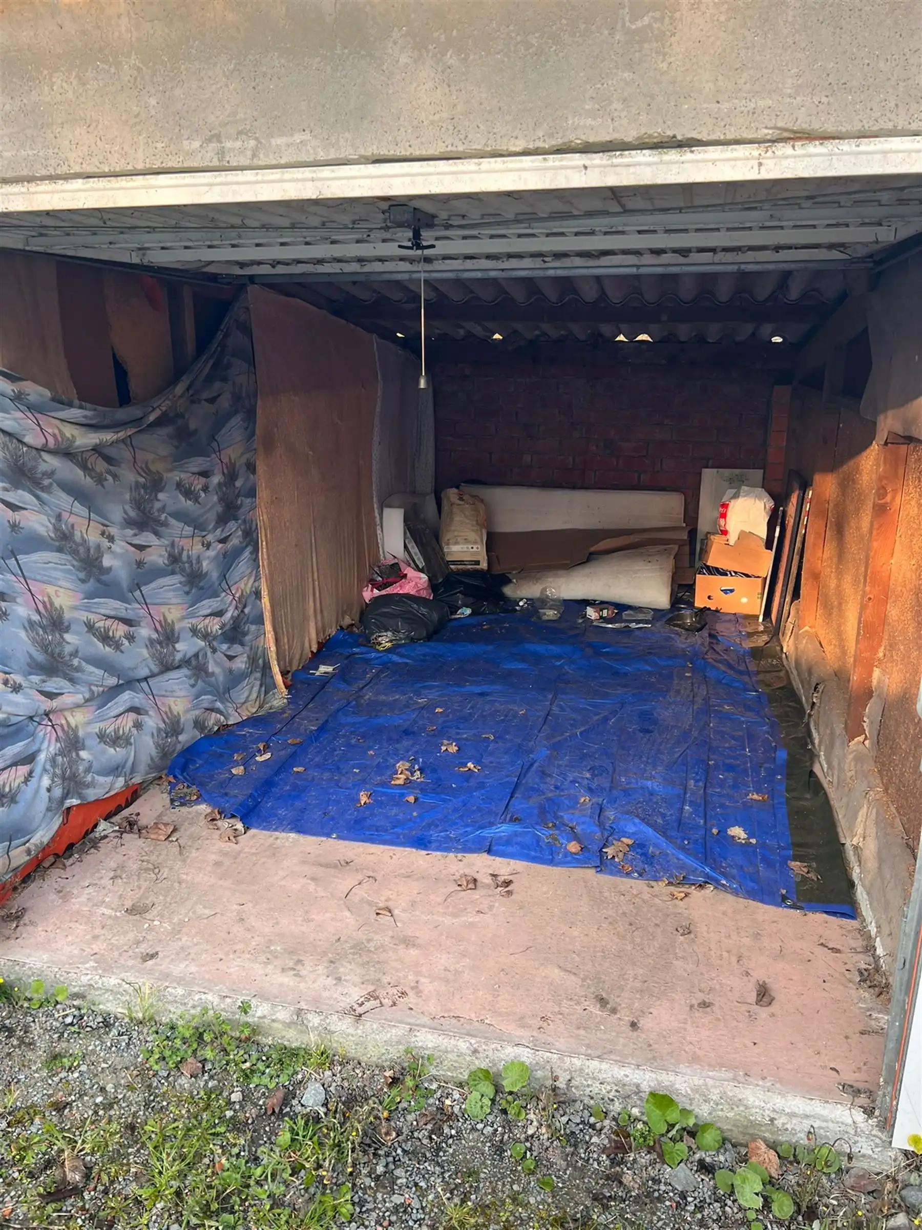 Ideale investering bouwgrond met 20 achterliggende garageboxen foto 7