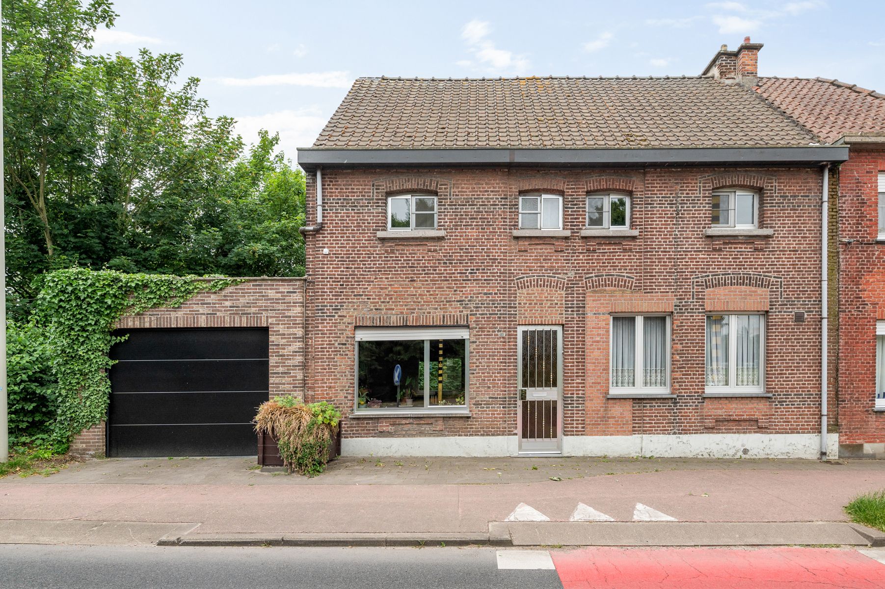 Gezinswoning met 4 slaapkamers, koele Z-tuin en garage in het hart van Boom foto 2