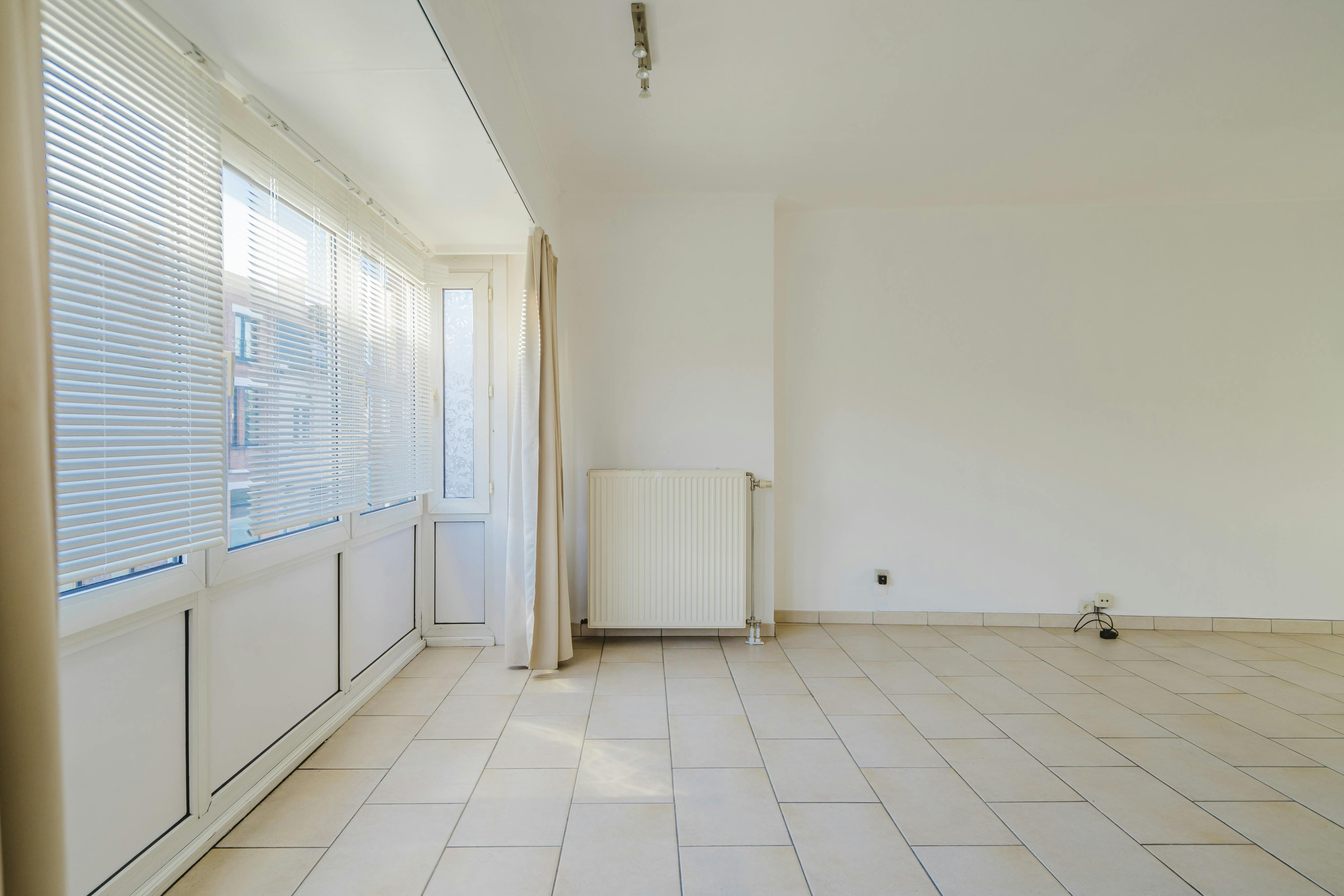 Interessante opbrengsteigendom te Kortrijk (Heule) foto 6