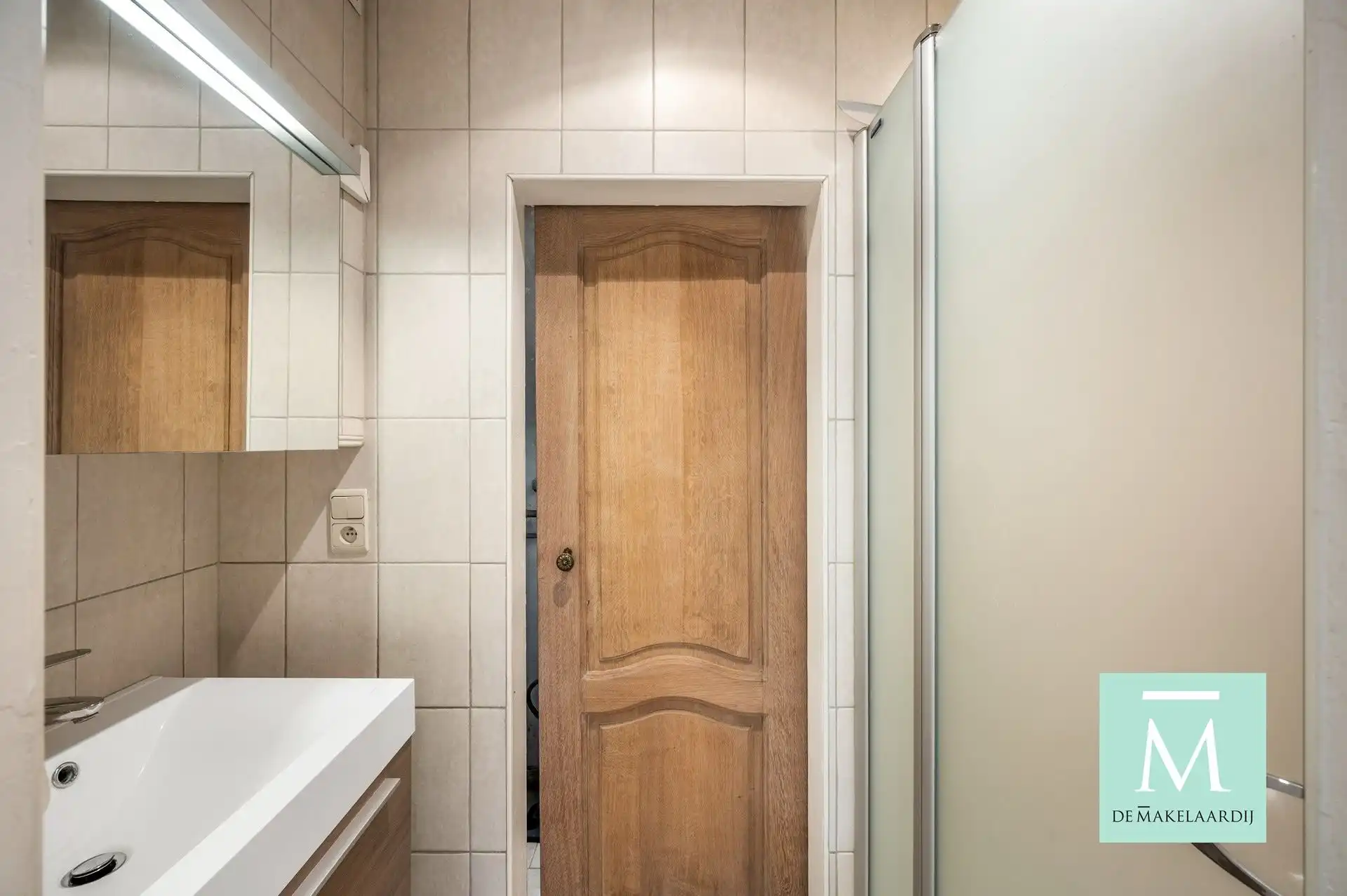Volledig gerenoveerde woning met aangename tuin  foto 14