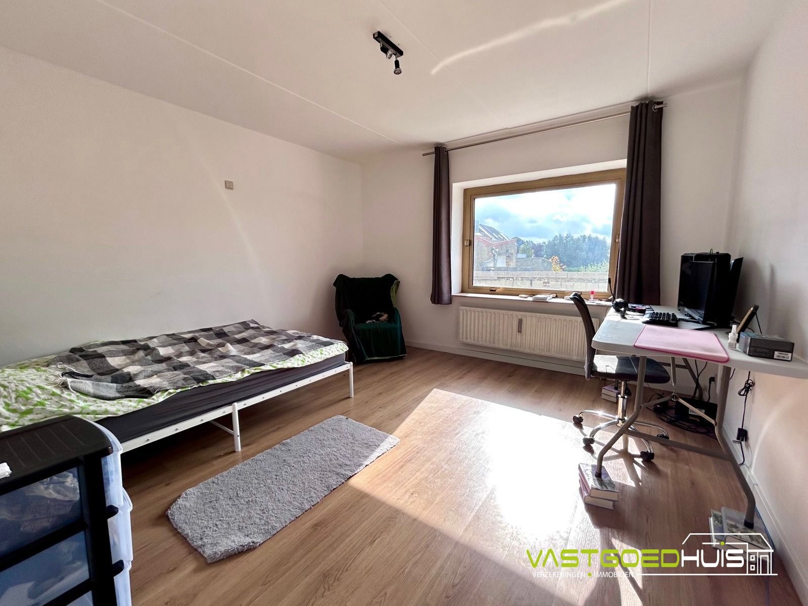 Ruim, gelijkvloers appartement met terras foto 13