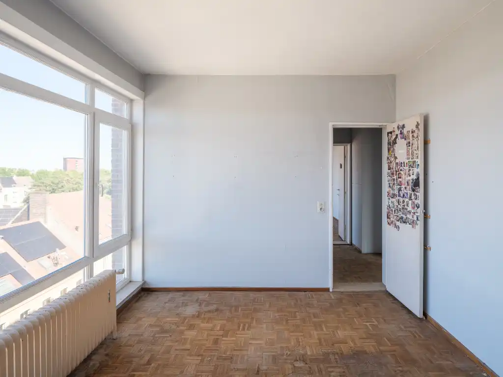 Appartement met panoramisch stadszicht op toplocatie nabij de Coupure foto 6