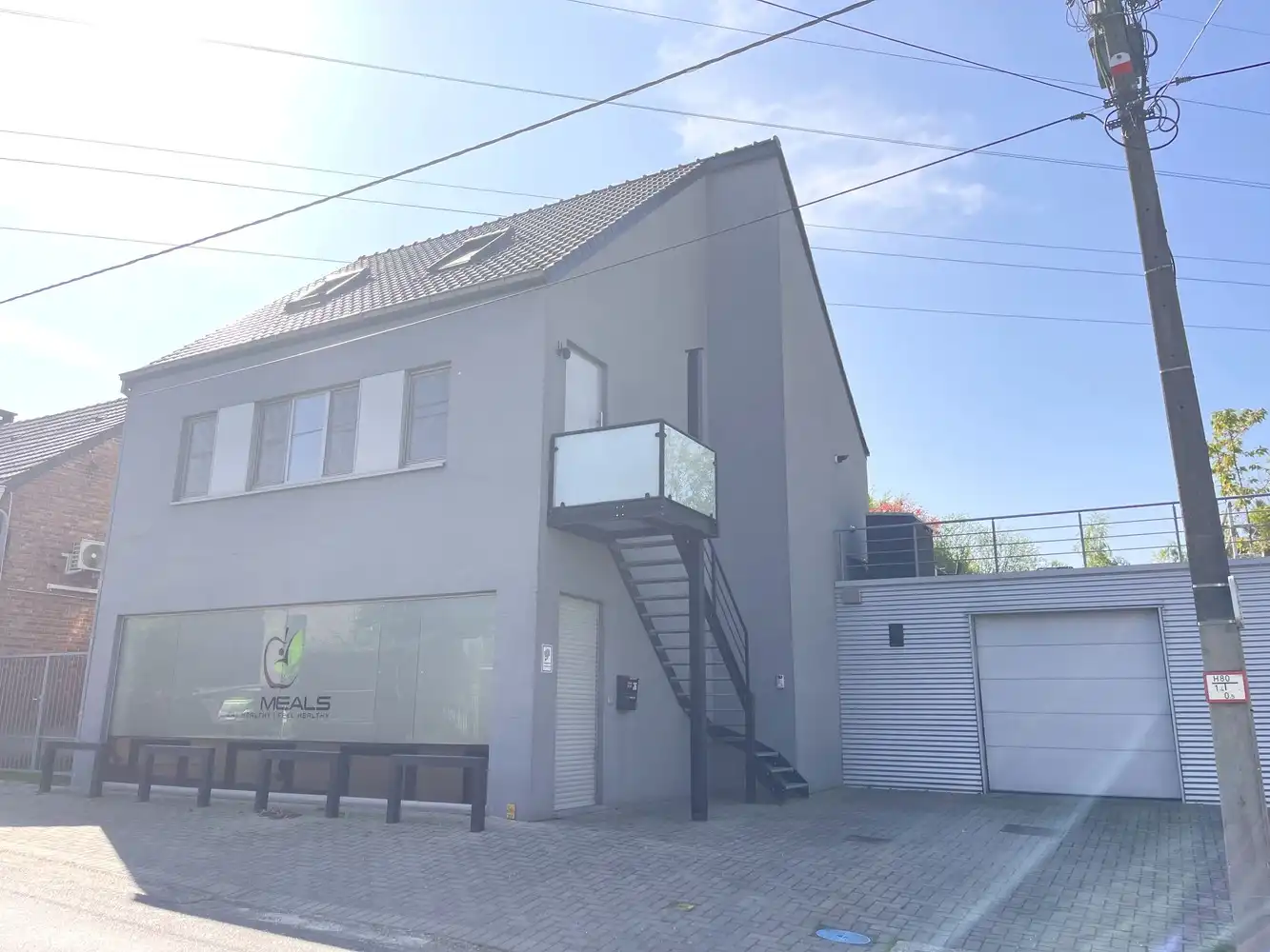 Halfopen bebouwing bestaande uit polyvalent gelijkvloers met woonst foto 3