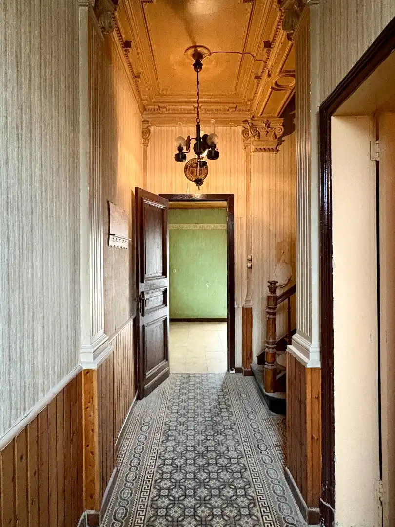 Halfopen herenhuis te koop in Kooigem op 1.382 m² grond foto 2