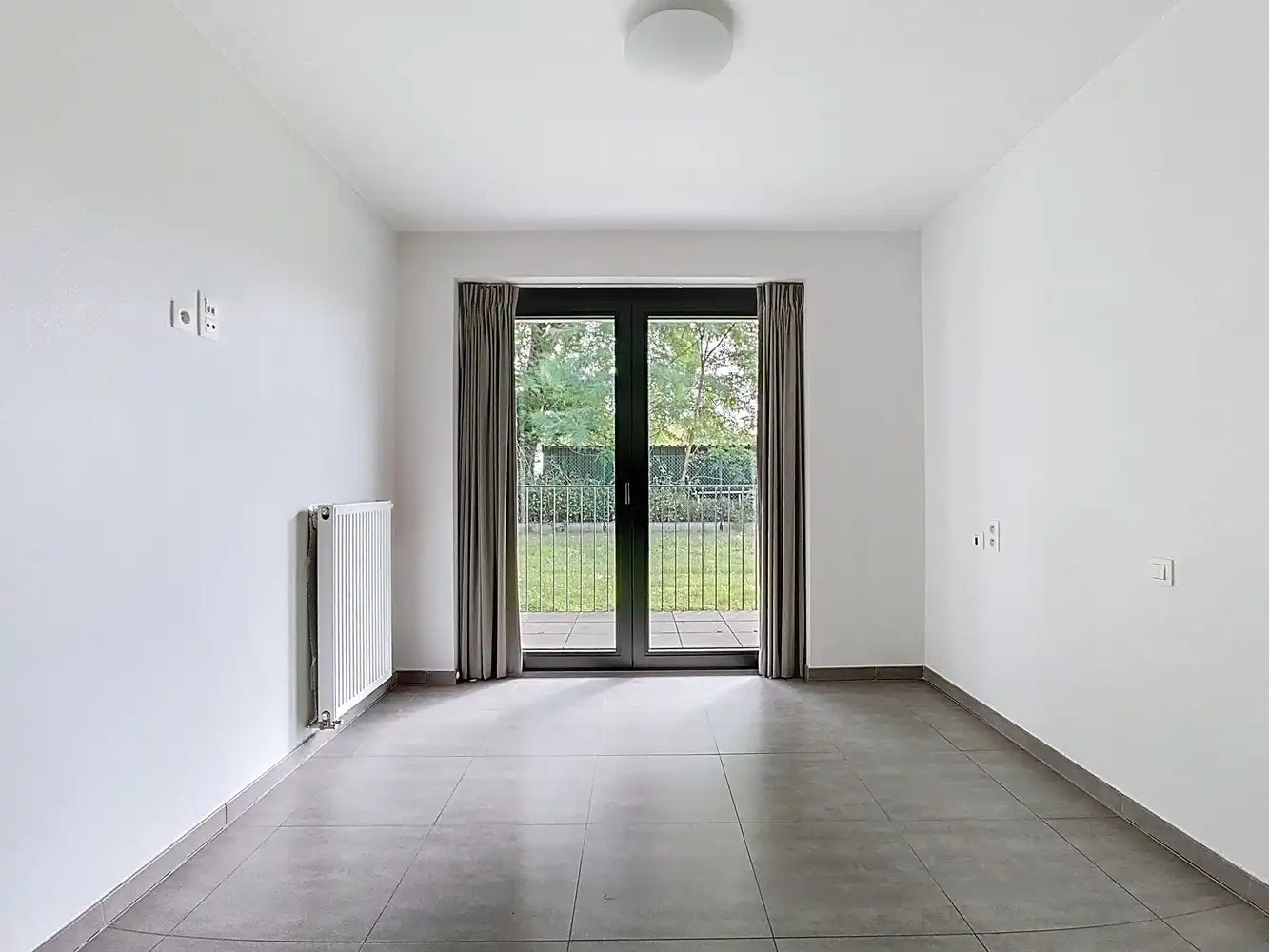 Ruim gelijkvloers appartement voor senioren met zicht op pastorietuin foto 15