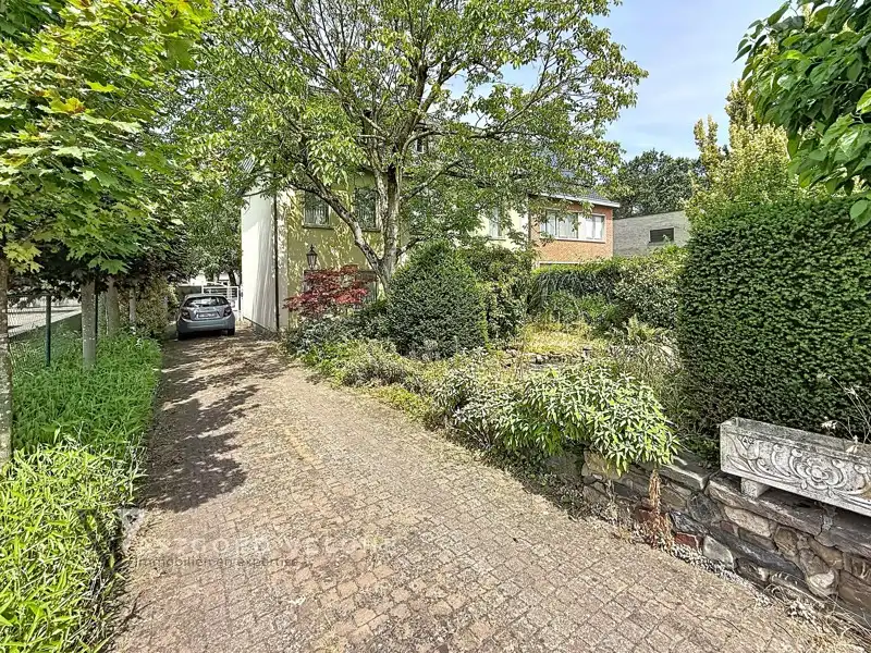 Ruime gezinswoning met zorgwoning in Genk-Centrum foto 30