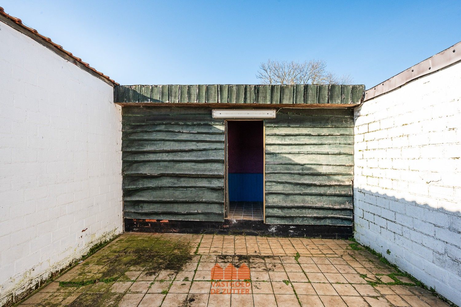 Ruime woning met handelspand in het centrum van Boekhoute foto 16