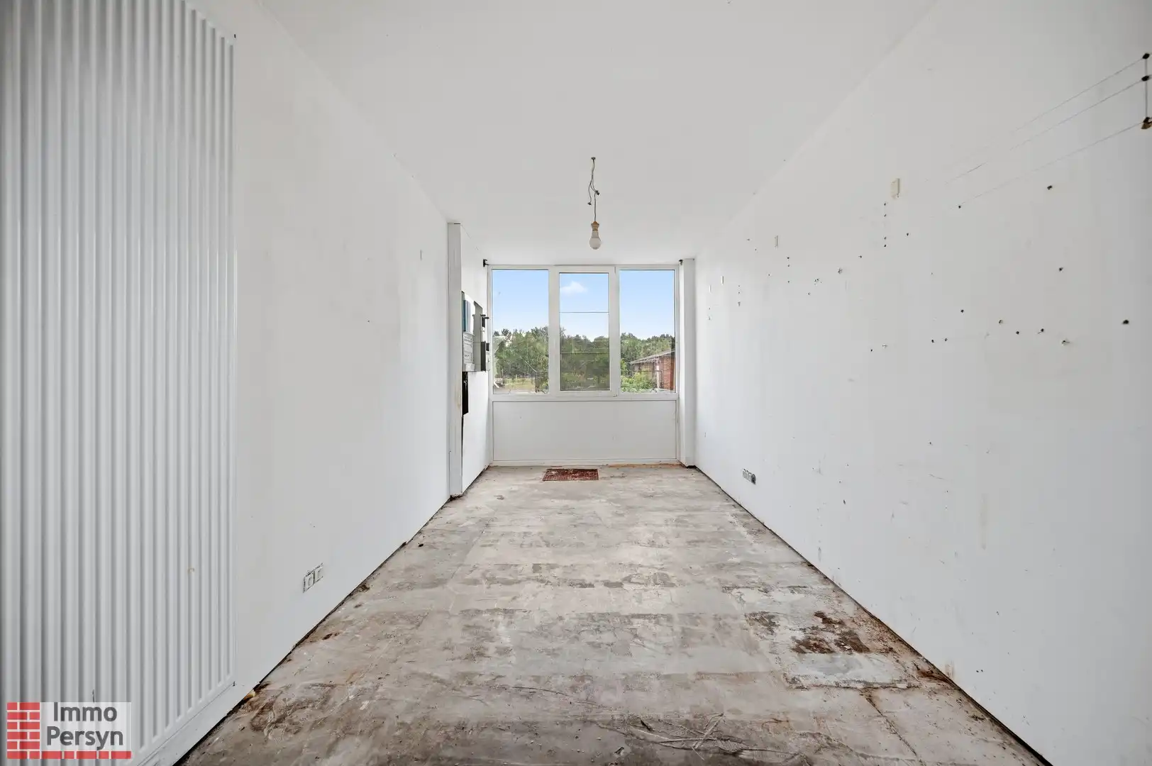 Ruime af te werken woning met nieuw dak, vernieuwde elektriciteit en diepe tuin  (EPC D) foto 9