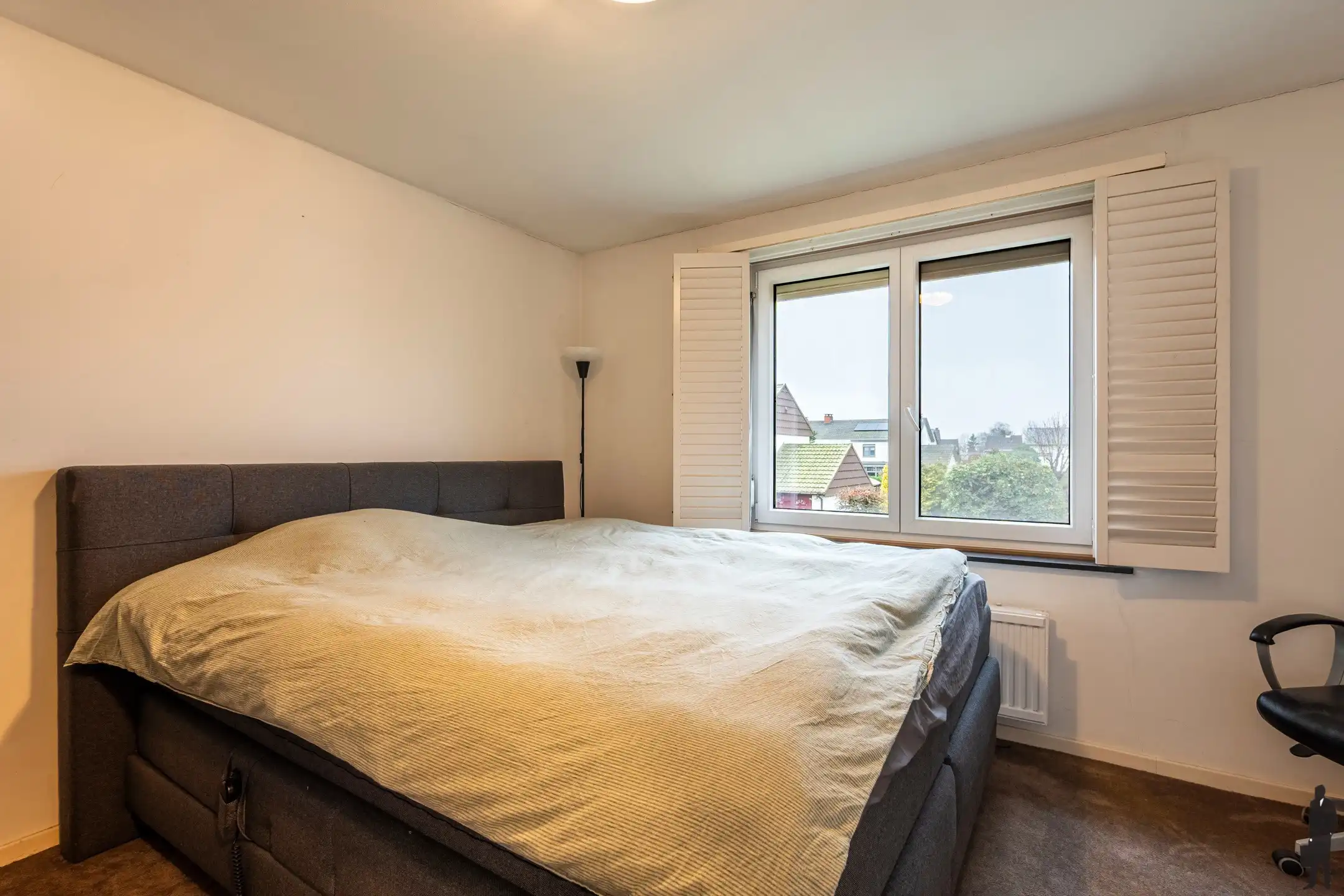 Instapklare woning met praktische indeling en zuidgerichte tuin foto 10