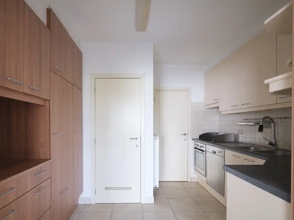 Appartement met 3 slaapkamers, aangenaam terras en autostaanplaats met prachtig en open zicht over de Leie. foto 7