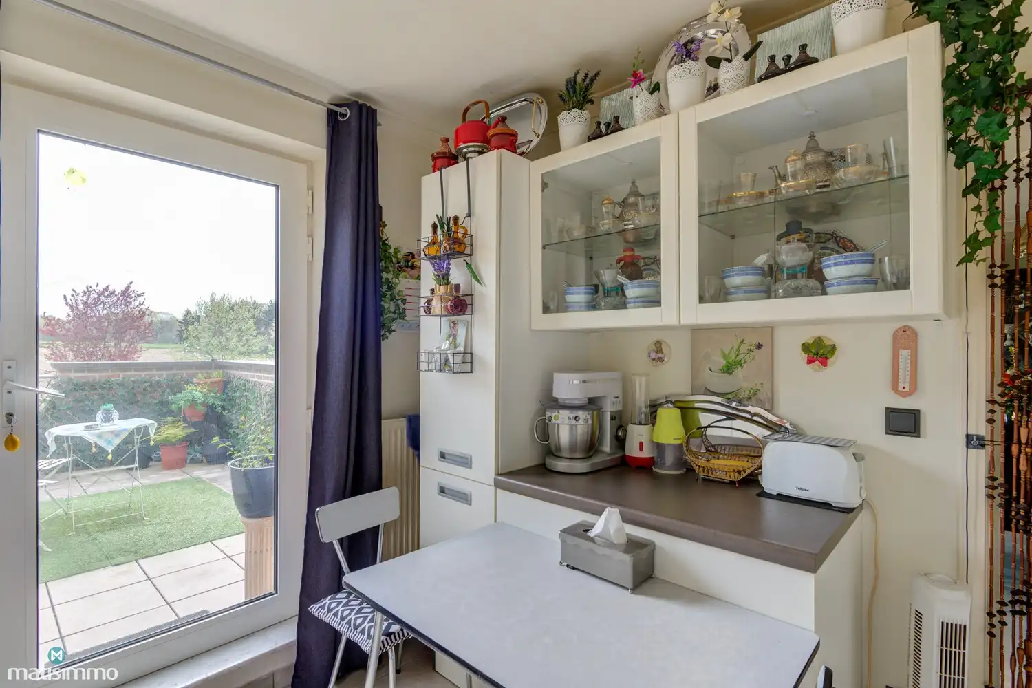 GOED ONDERHOUDEN APPARTEMENT MET GARAGE, KELDER EN RUIM ZUIDWESTGEORIËNTEERD TERRAS IN BILZEN foto 10
