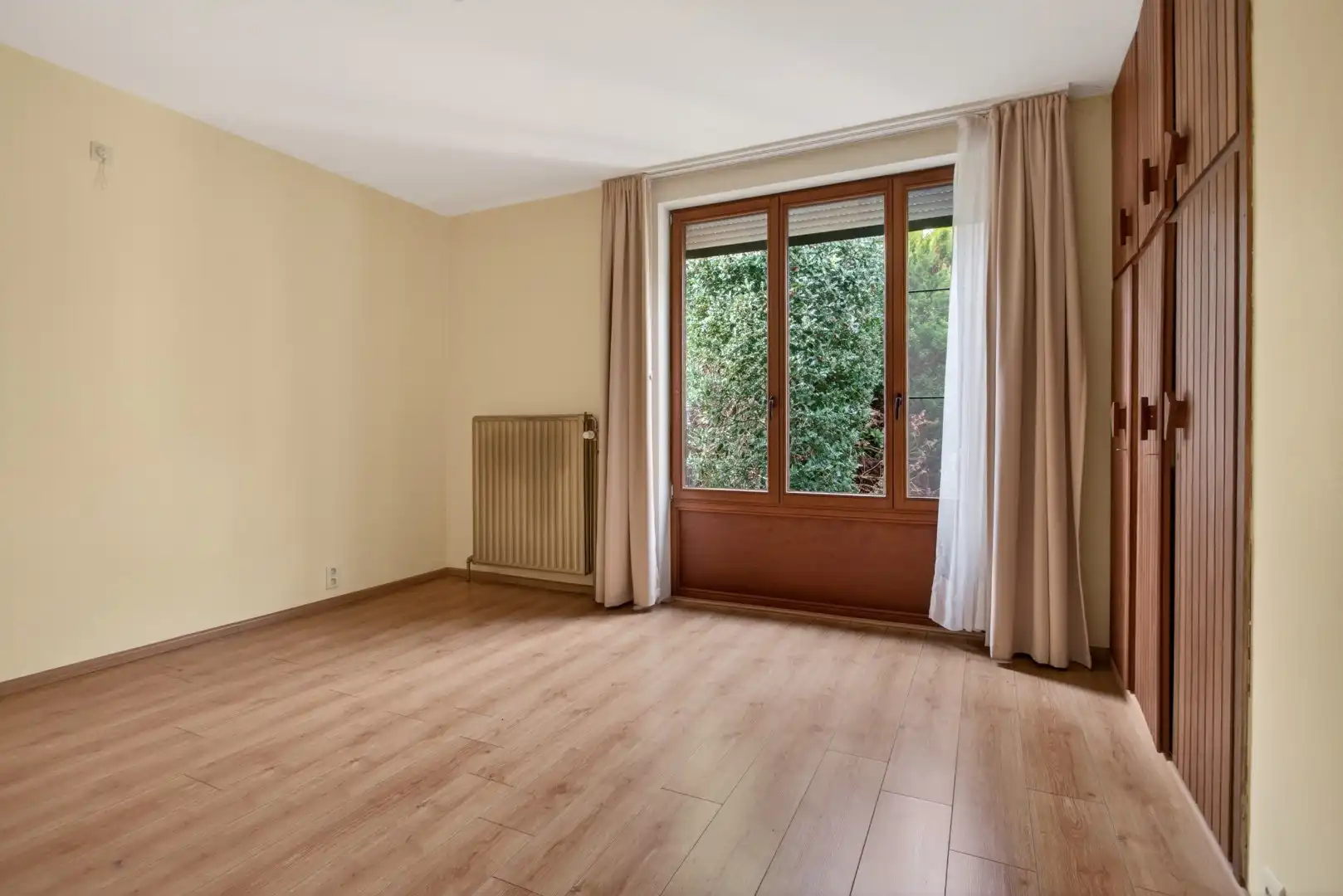 Ruime gelijkvloerse woning met veel potentieel op rustige ligging in Mol foto 5