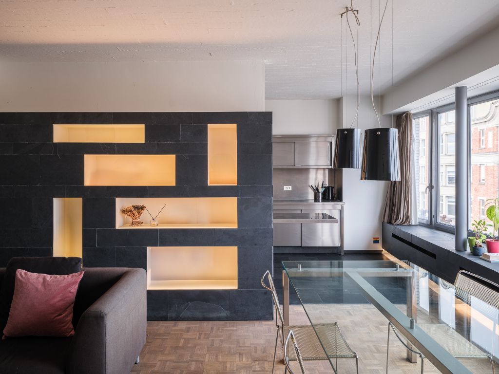 Tijdloos wonen in een ontwerp van Fabiaan Van Severen – nabij het Citadelpark foto {{pictureIndex}}