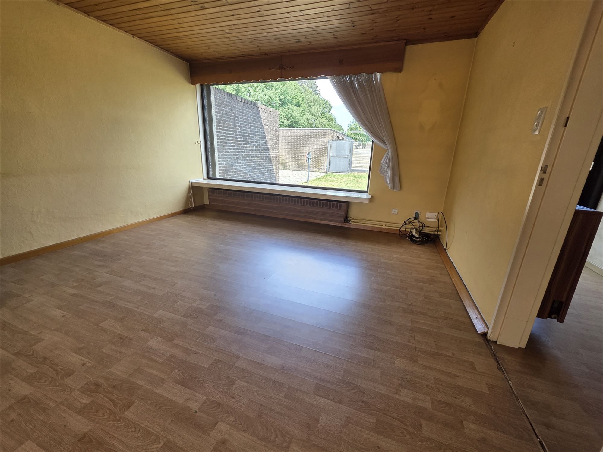 Knappe gezinswoning met 4 à 5 slpks, garage en tuin foto 5