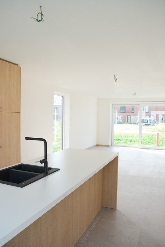 Instapklare nieuwbouwwoning met zonnige tuin te Roeselare foto 4