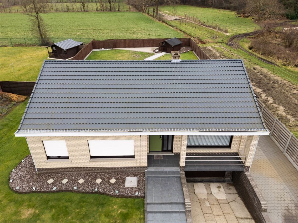 Netjes onderhouden woning op 11a95 grenzend aan agrarisch gebied foto 37