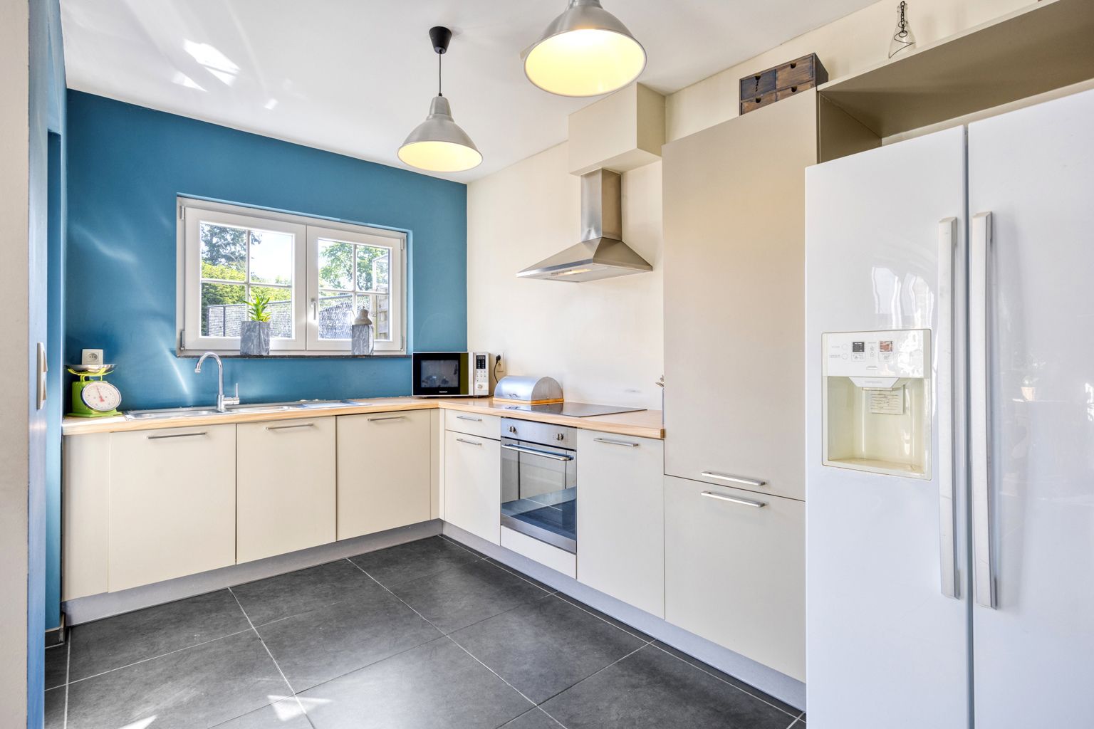 Instapklare recente woning met tuintje en carport foto 10