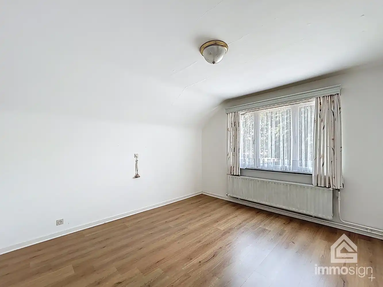 Charmante gezinswoning met potentieel op ruim hoekperceel in hartje Eksel foto 24