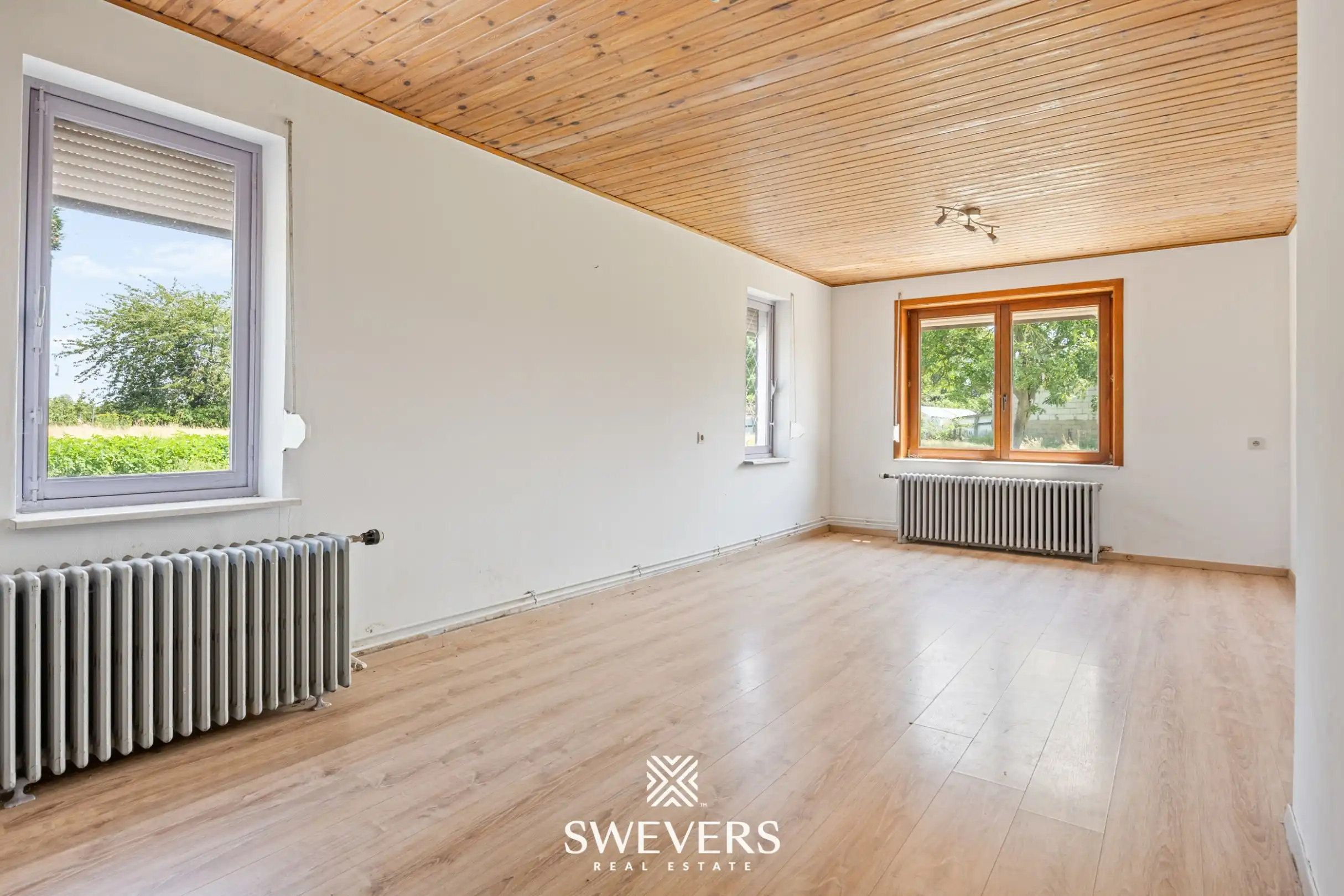Vrijstaande woning met groot perceel en enorm renovatiepotentieel in Herk-de-Stad foto 28