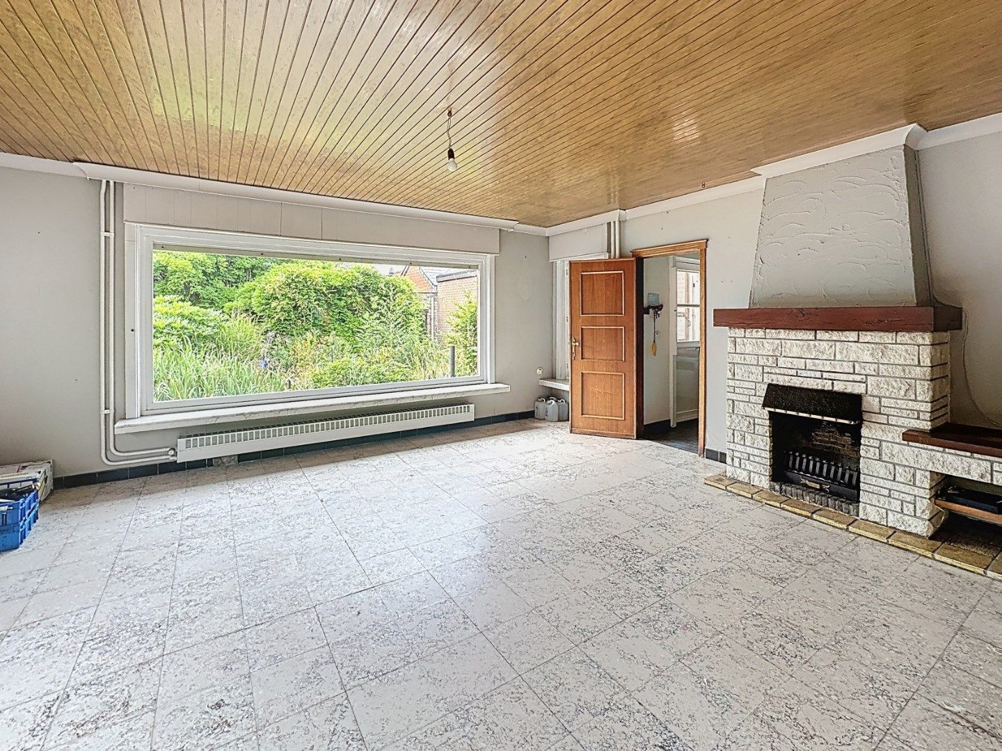 Te renoveren woning op afgesloten perceel van 936m² foto 2