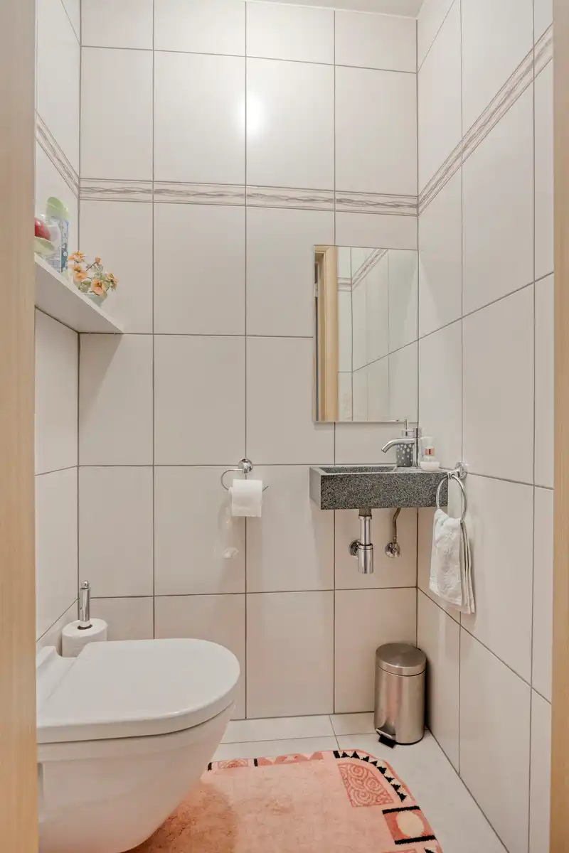 Instapklaar gelijkvloers appartement in centrum Buggenhout foto 12