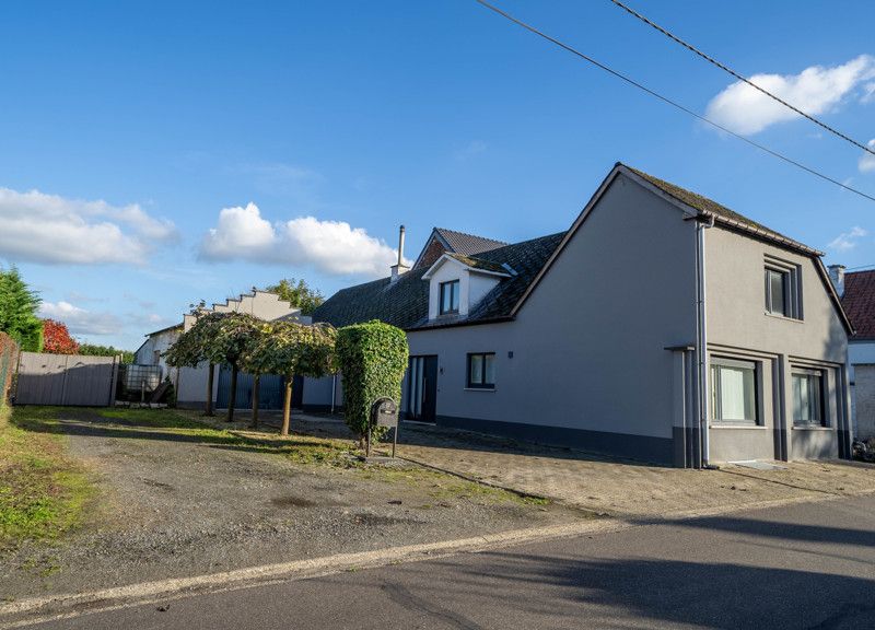 Rustig gelegen woning op 8are met aanpalende garage en zwembad foto 5