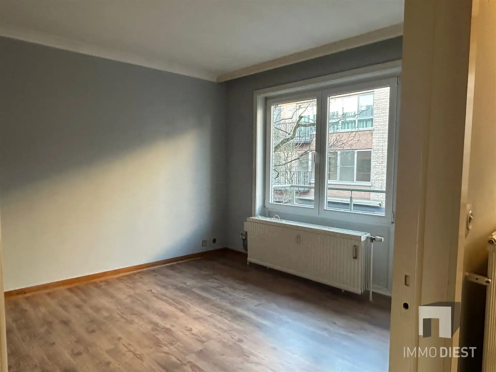 Degelijk appartement centrum Diest - ruime slaapkamer foto 4