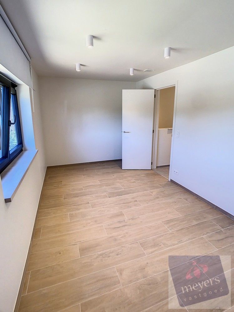 Recent en energiezuinige halfopen woning op toplocatie in Zonhoven foto 12