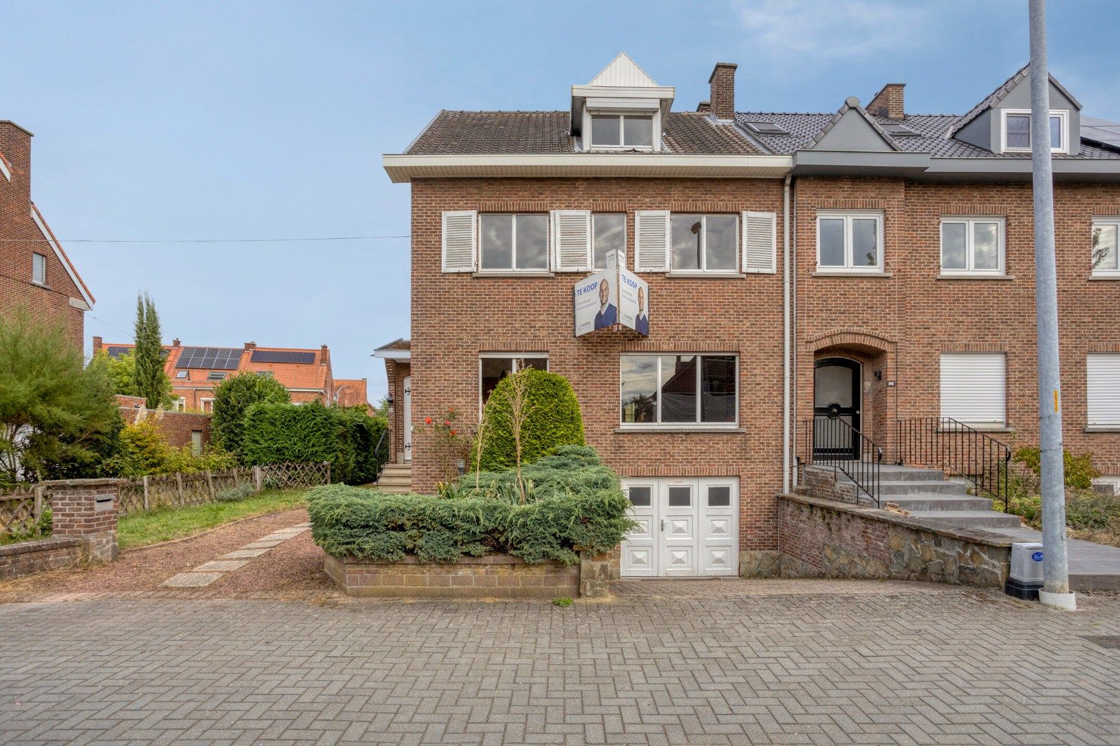 Hoofdfoto van de publicatie: Halfopen bebouwing met 4 slaapkamers,  bureau en ruime tuin in Kessel-Lo - bewoonbare opp. 179 m² 