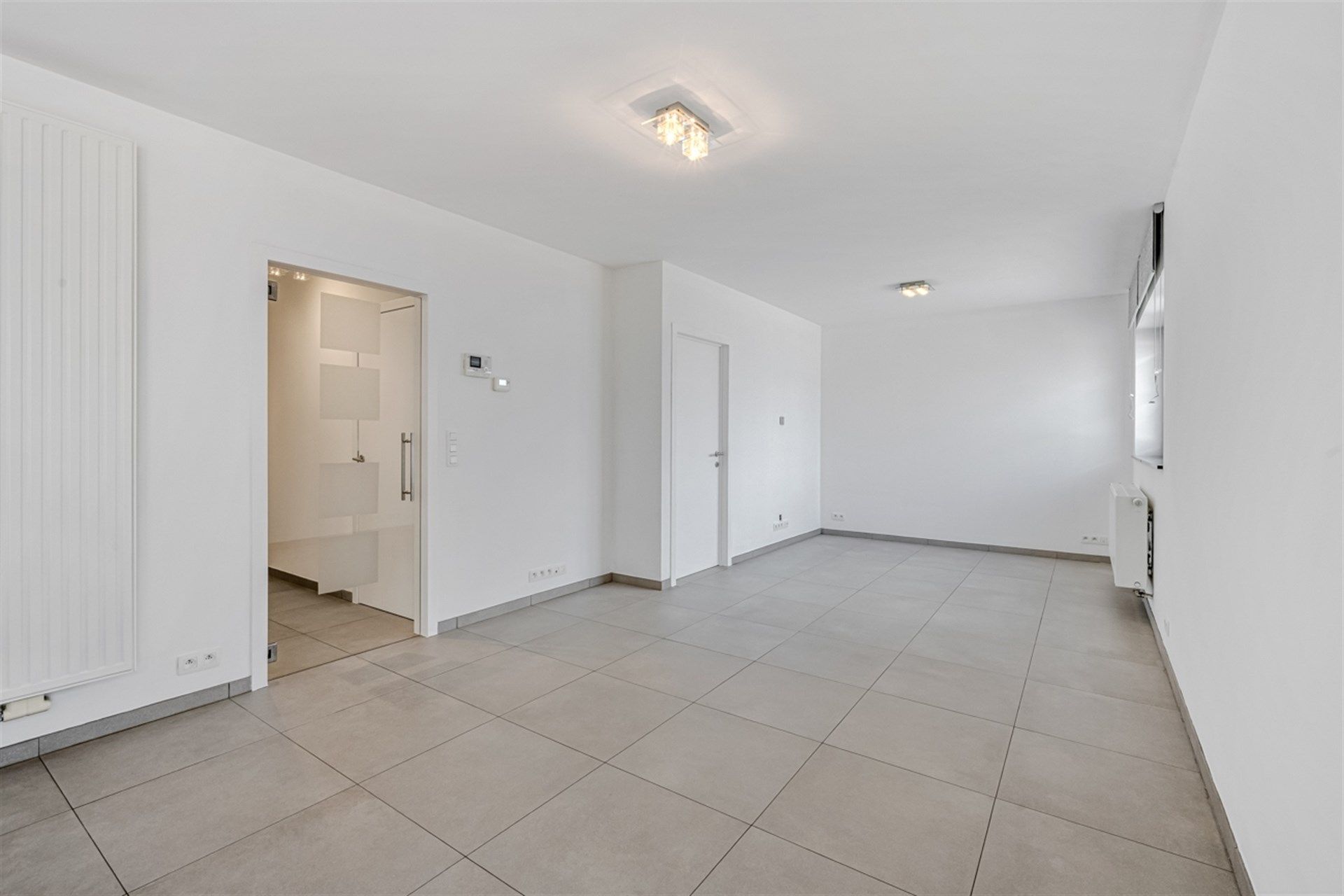Instapklaar gelijkvloers appartement met zonnig terras foto 3