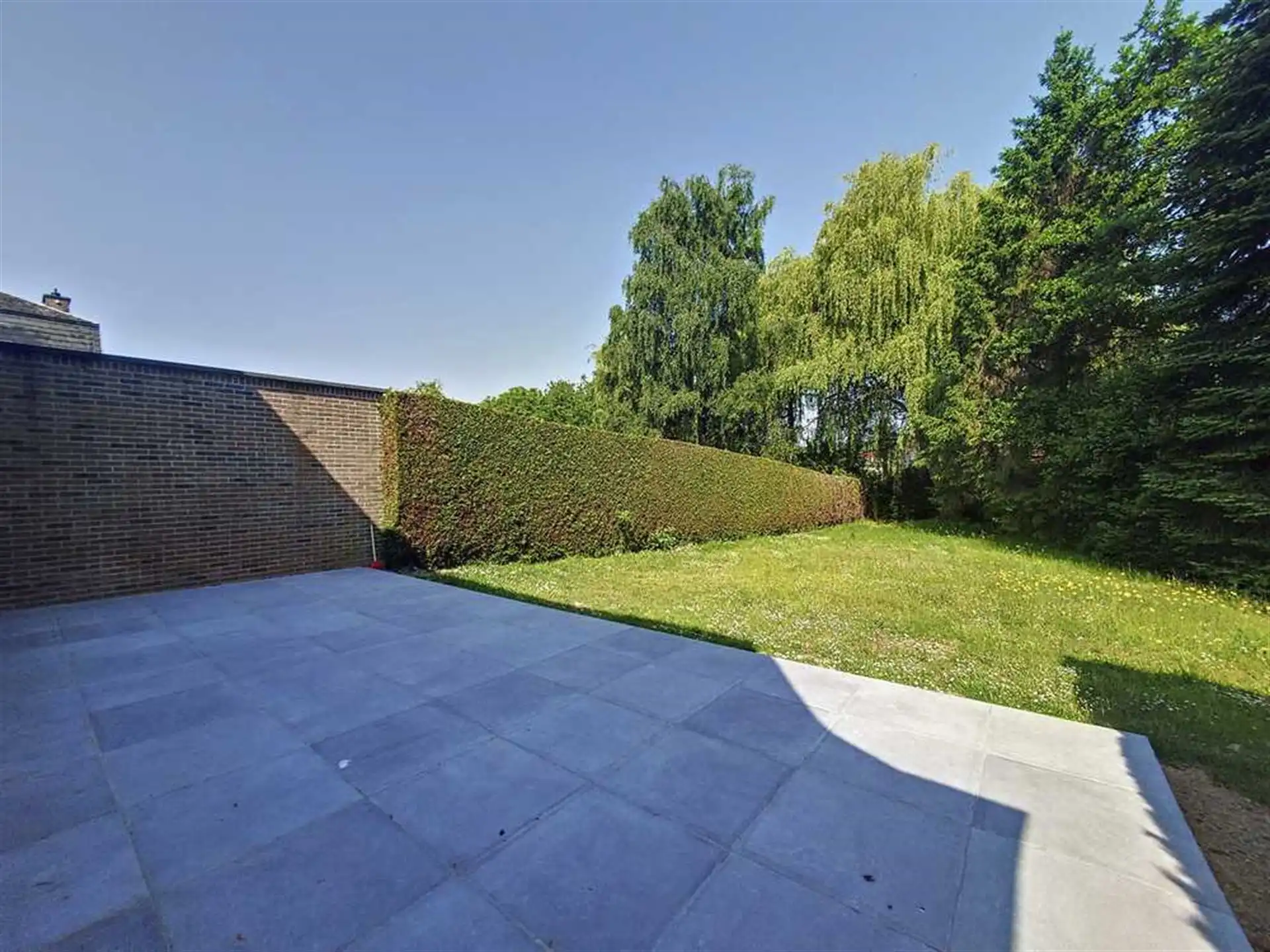 Villa met mooie tuin in rustige straat foto 12