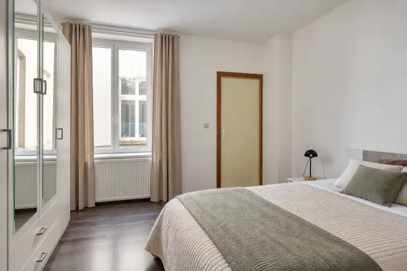 Ruim en lichtrijk 2-slaapkamerappartement in het centrum van Ronse foto 6