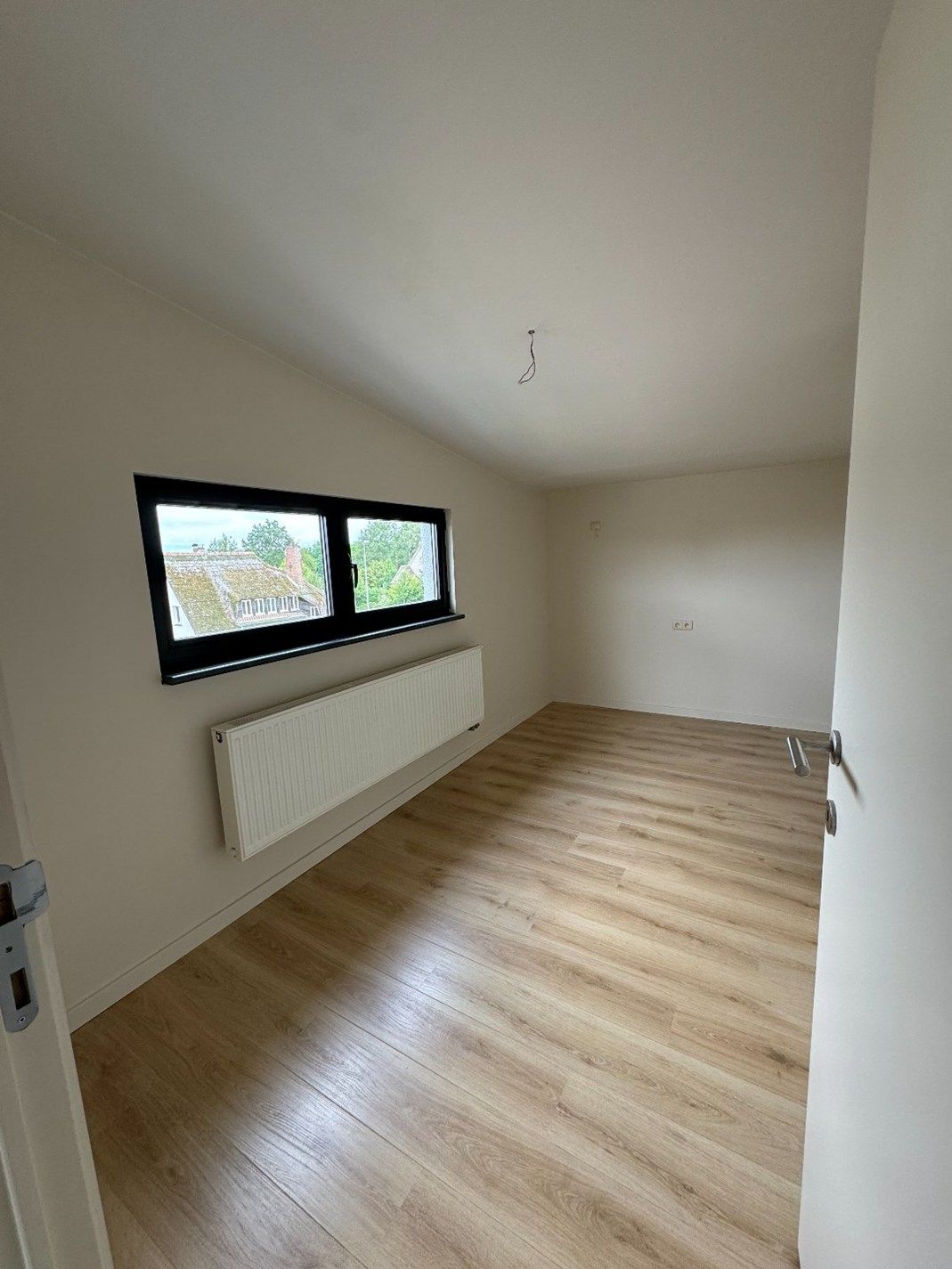 Duplex appartement met 3 slaapkamers en 2 autostaanplaatsen in hartje Beringen foto 14