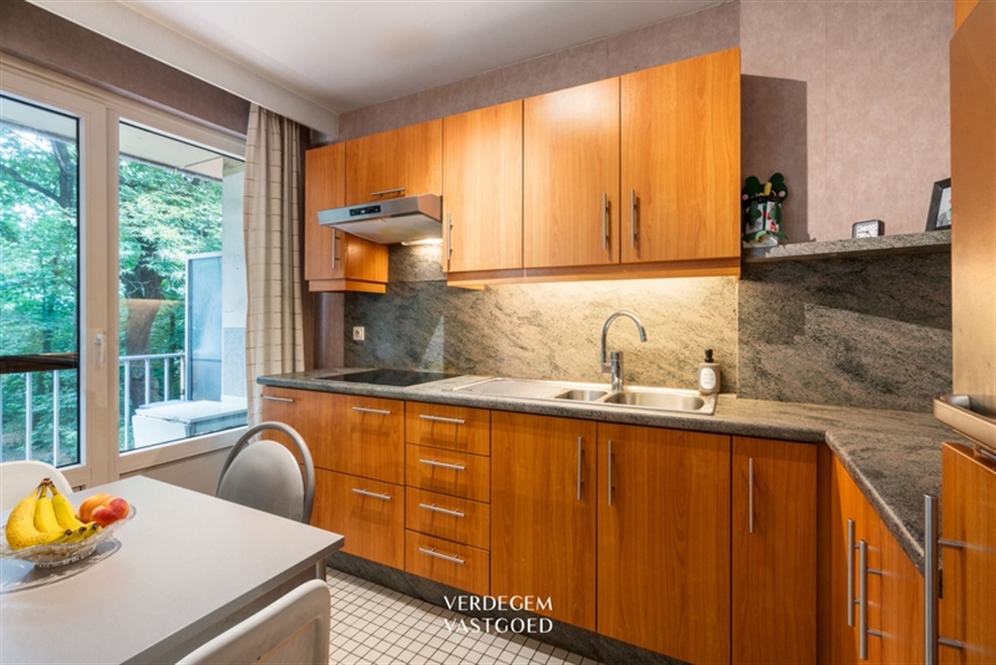 Rustig en groen gelegen appartement met 2 slaapkamers en garage foto 4