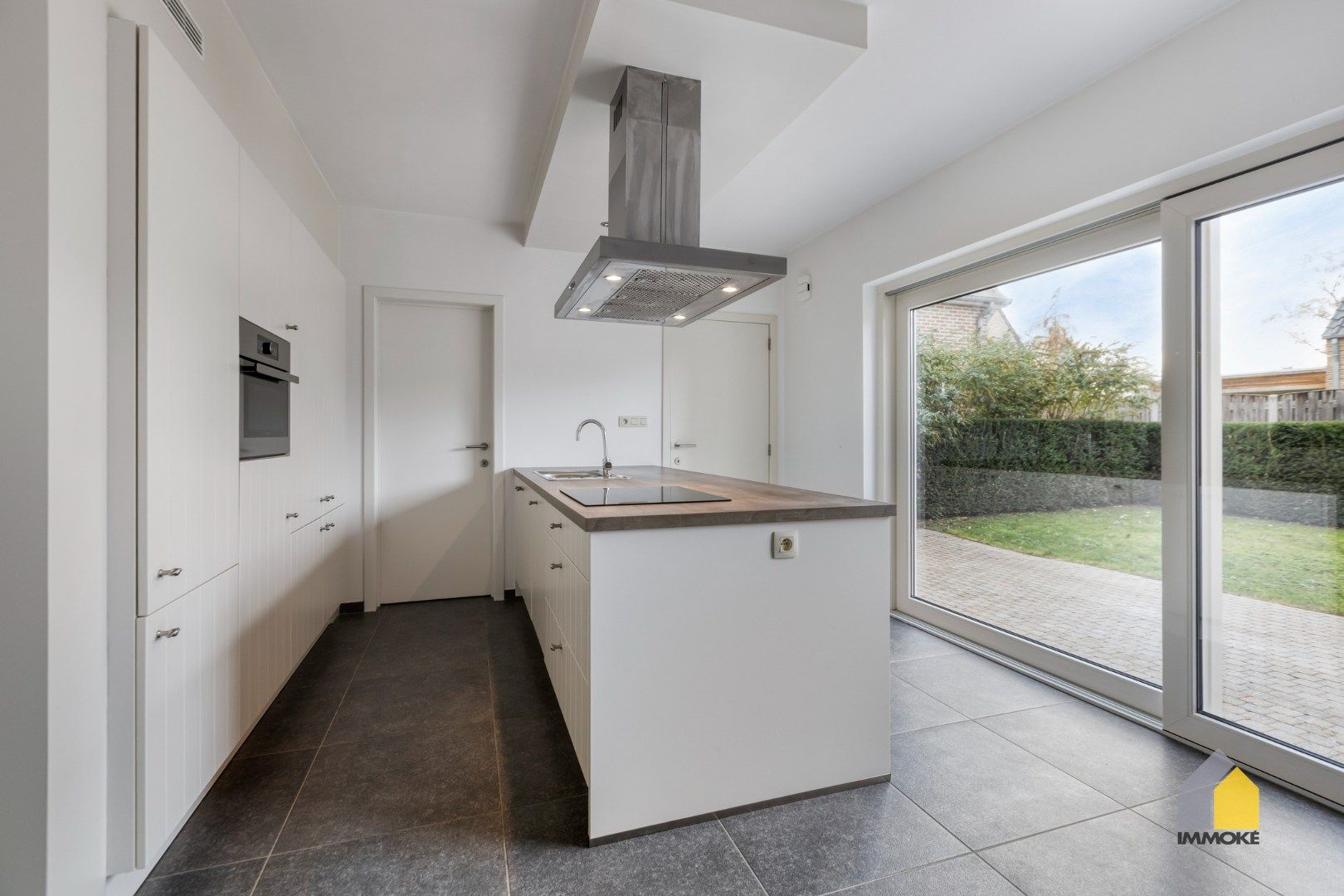 Energiezuinige woning op 3 a 14 ca met 3 slpk, 2 badkamers en knusse tuin. foto 8