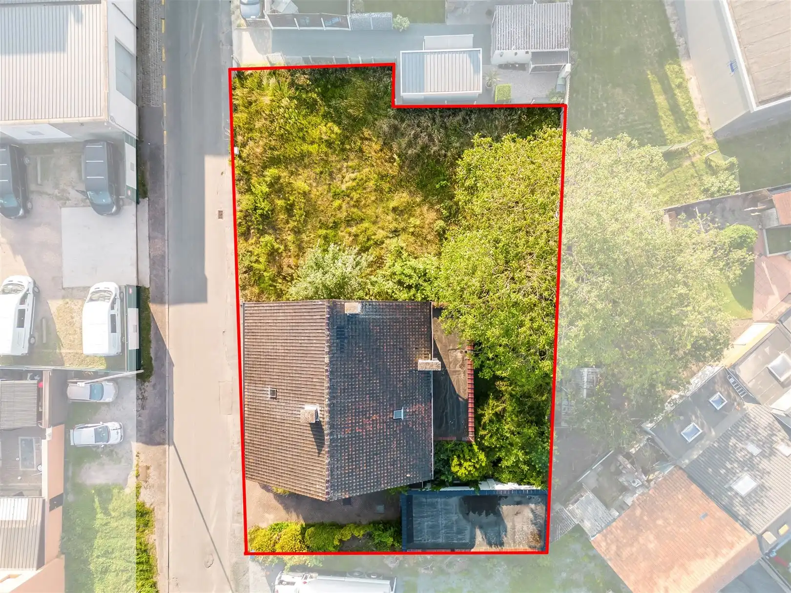 Halfopen bebouwing met aangrenzende bouwgrond - Tal van mogelijkheden foto 2