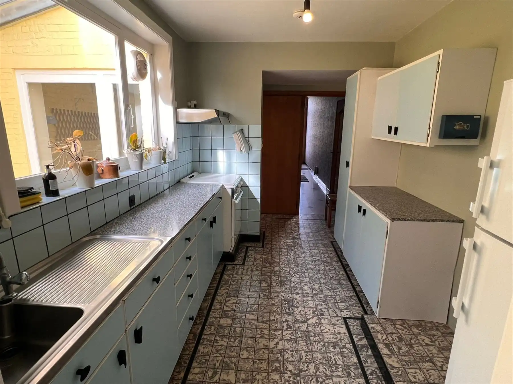 Gezellige woning met 3 slaapkamers, mooie tuin en zolder met mogelijkheden foto 3