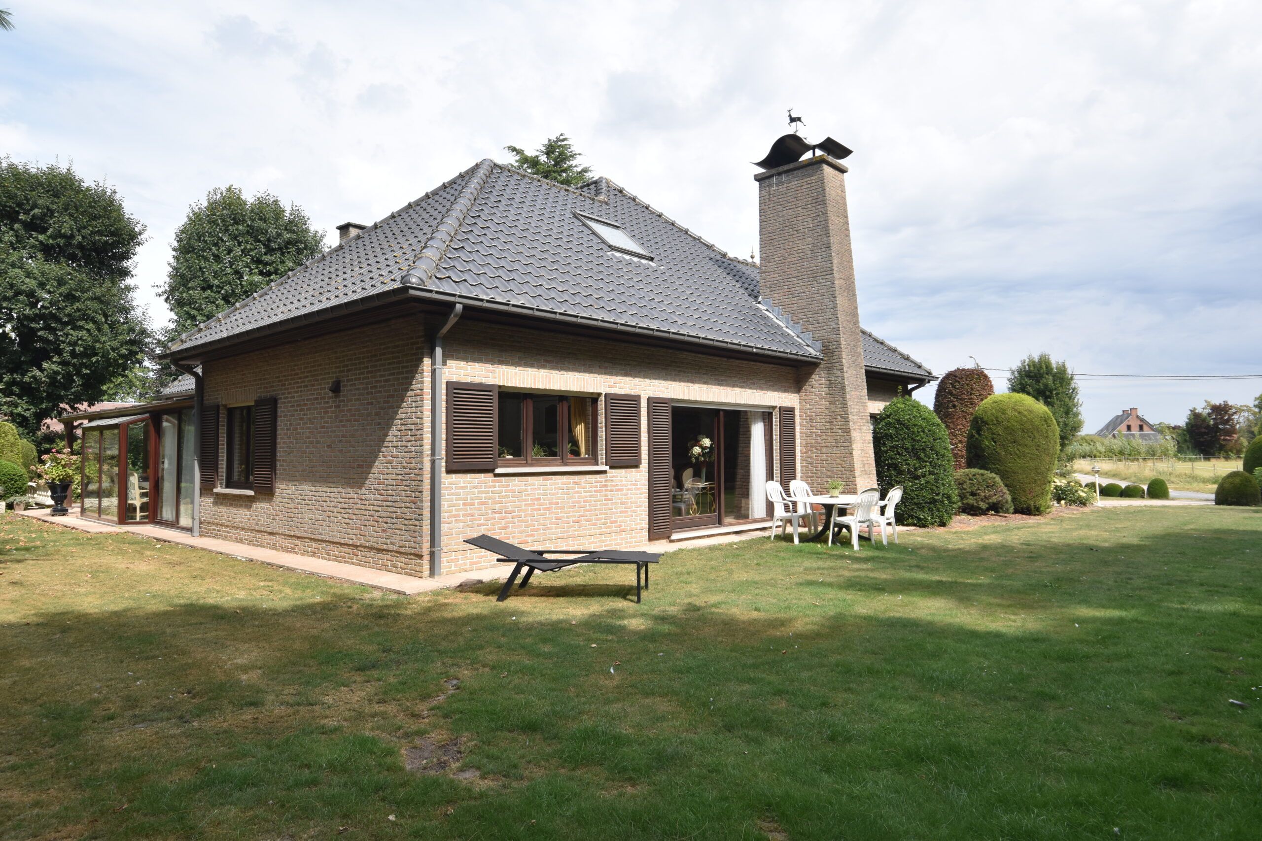 Ruim landhuis met prachtige tuin in rustige straat in Nieuwkerken foto 3