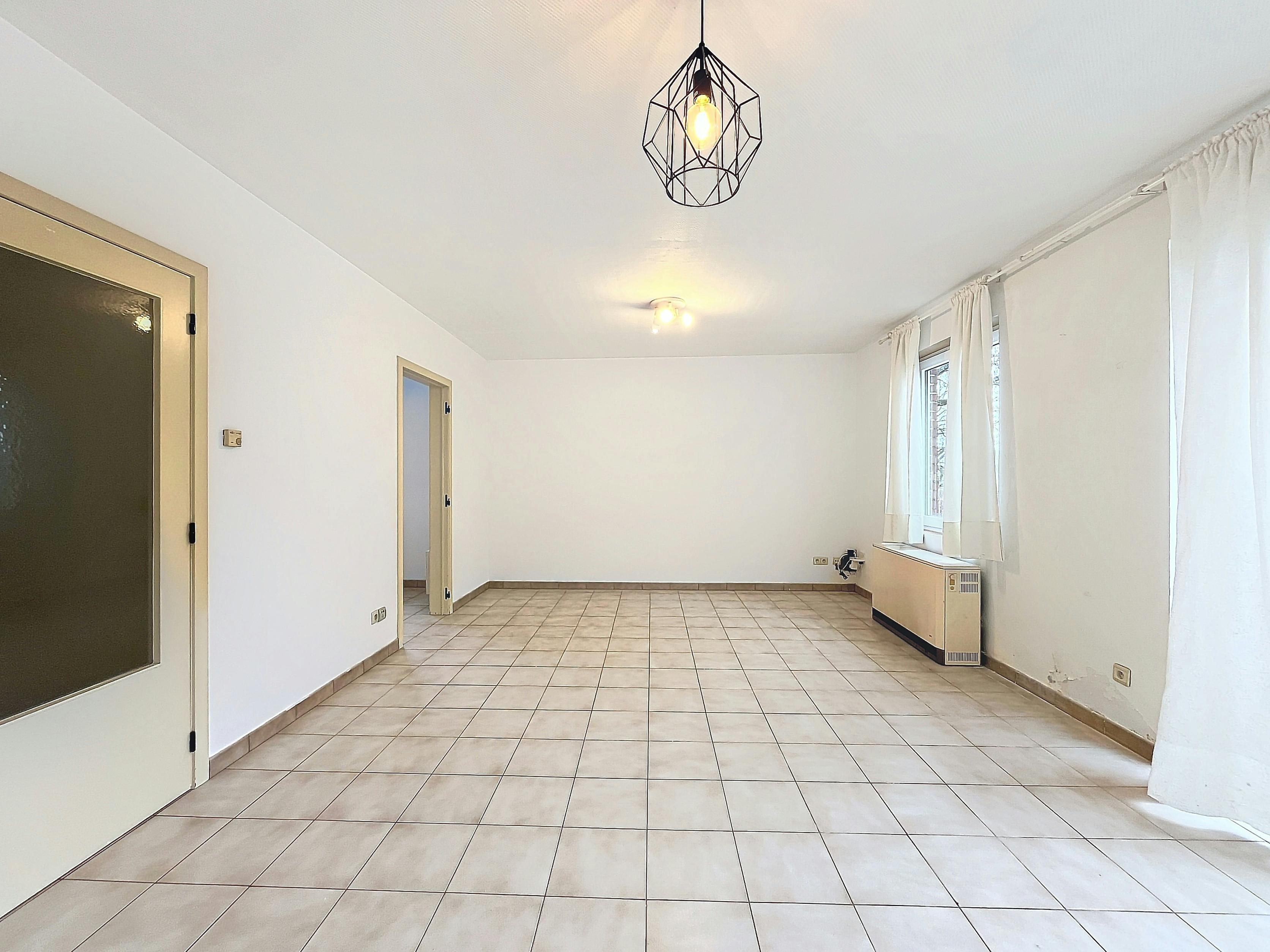 Ruim 1-slaapkamerappartement met garagebox! foto 3