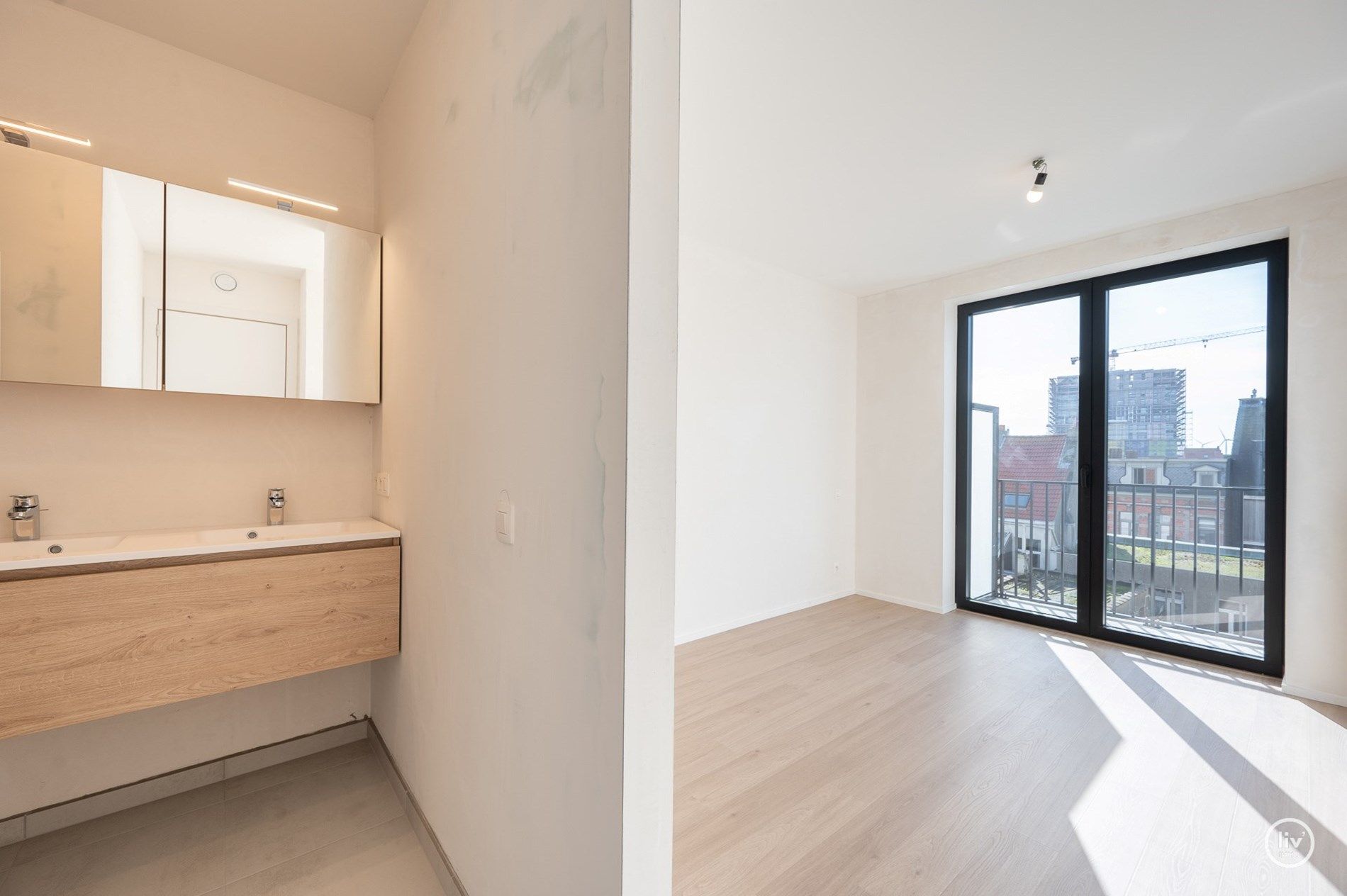 NIEUW - Magnifiek nieuwbouwappartement met twee slaapkamers, op wandelafstand van het strand te Heist. Het appartement is gelegen op de derde verdieping.  foto 12