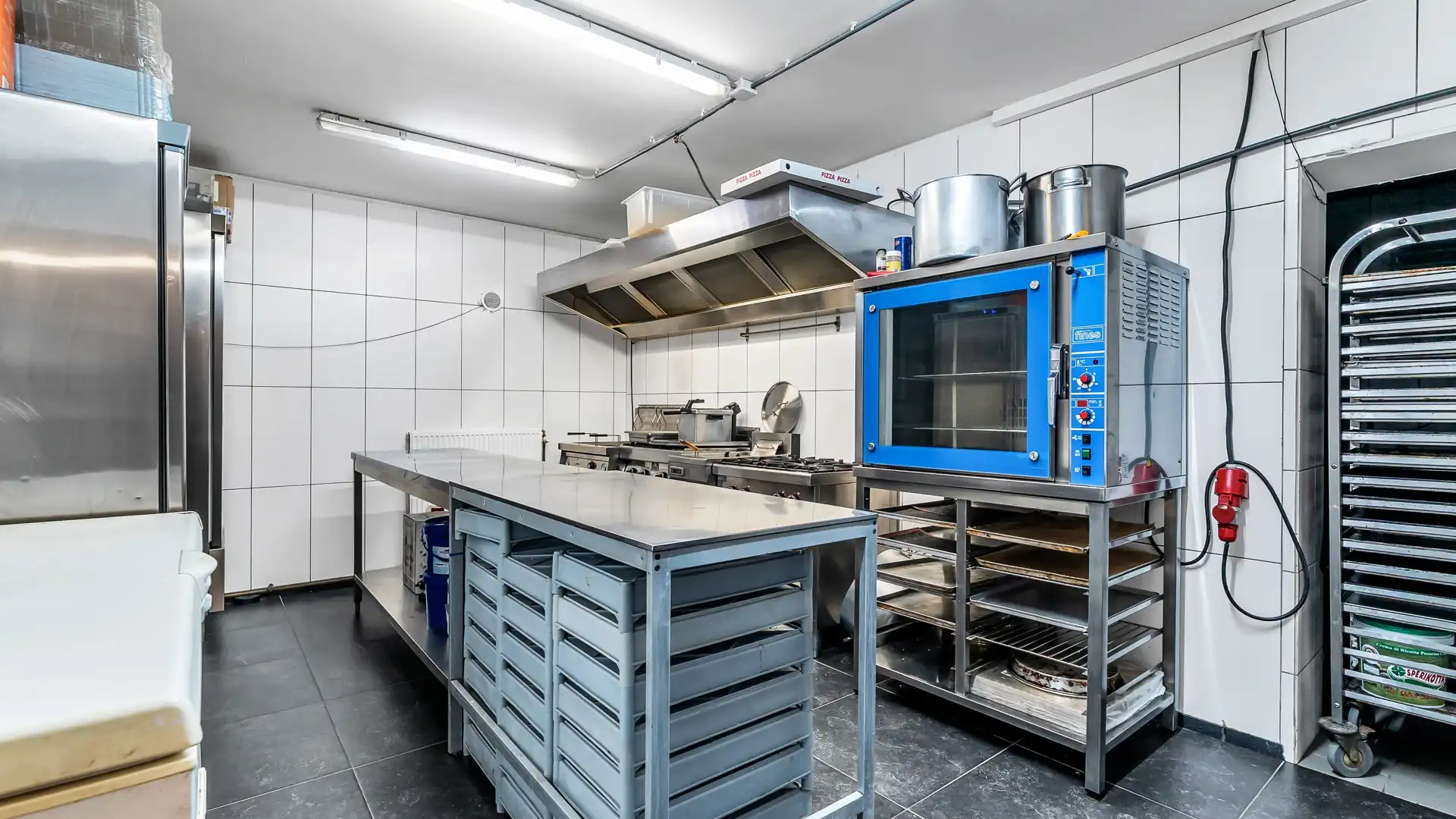 Wonen boven je zaak? Ontdek deze instapklare opportuniteit in het hart van Maasmechelen foto 9